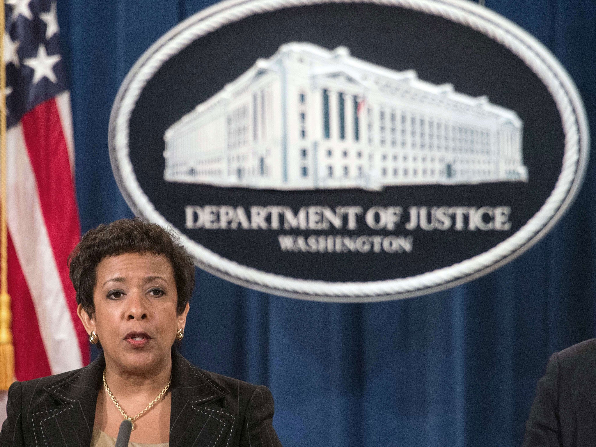 US Attorney General Loretta Lynch speaks at a press conference about the corruption scandal engulfing FIFA at the Justice Department in Washington, DC, on December 3, 2015.