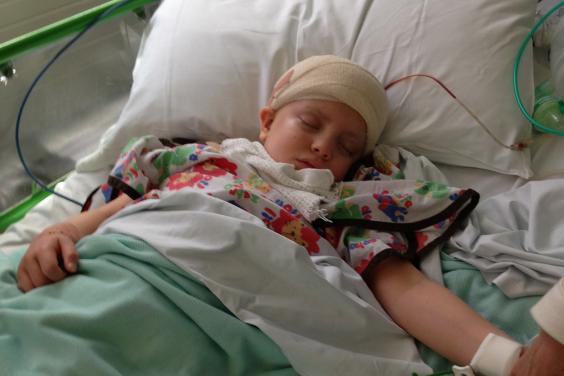 Millie after a third operation on her brain