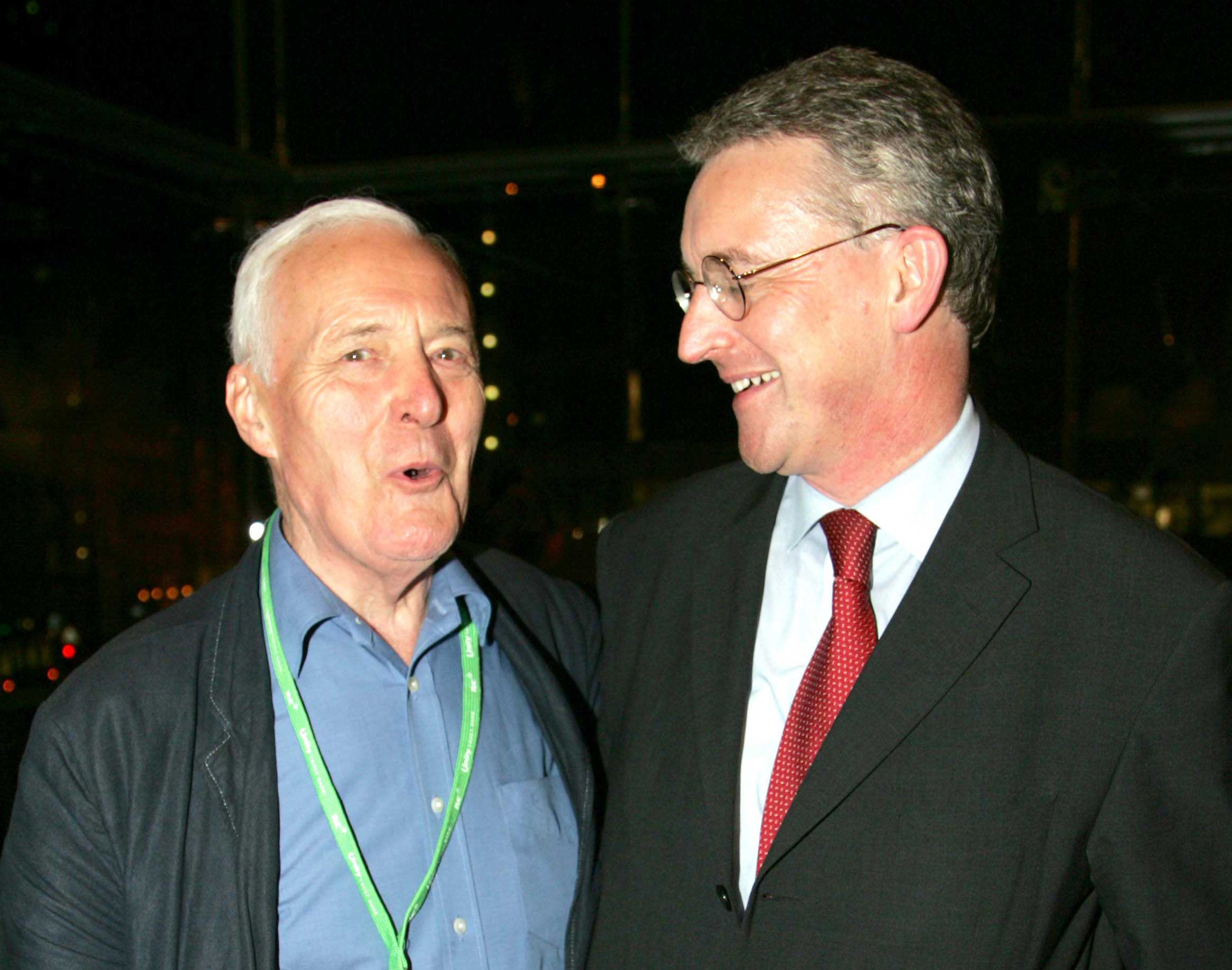 Hilary Benn embraces his father at a New Statesman party