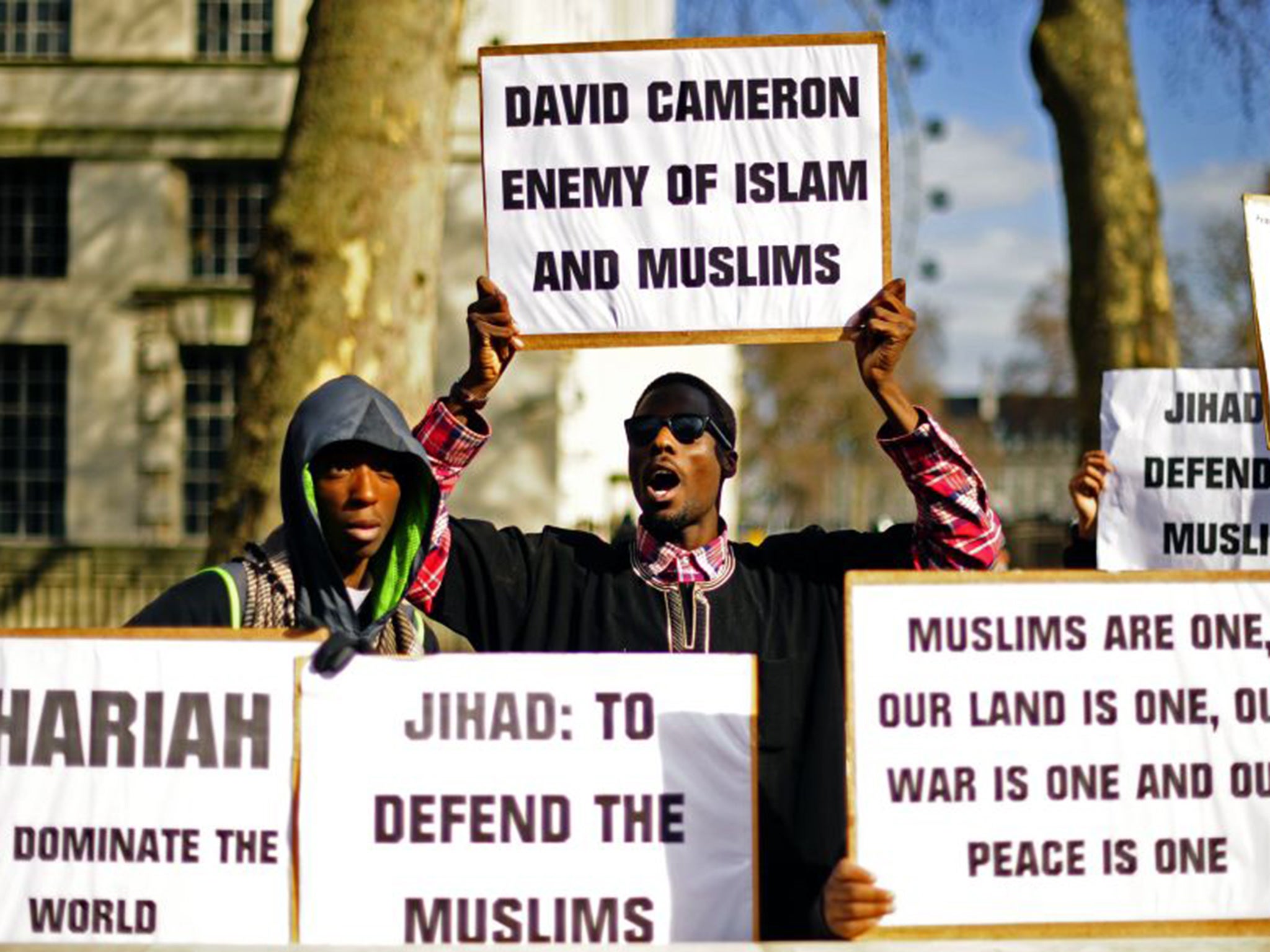 Protesters demonstrate in favour of Sharia law for Libya outside 10 Downing Street in 2011