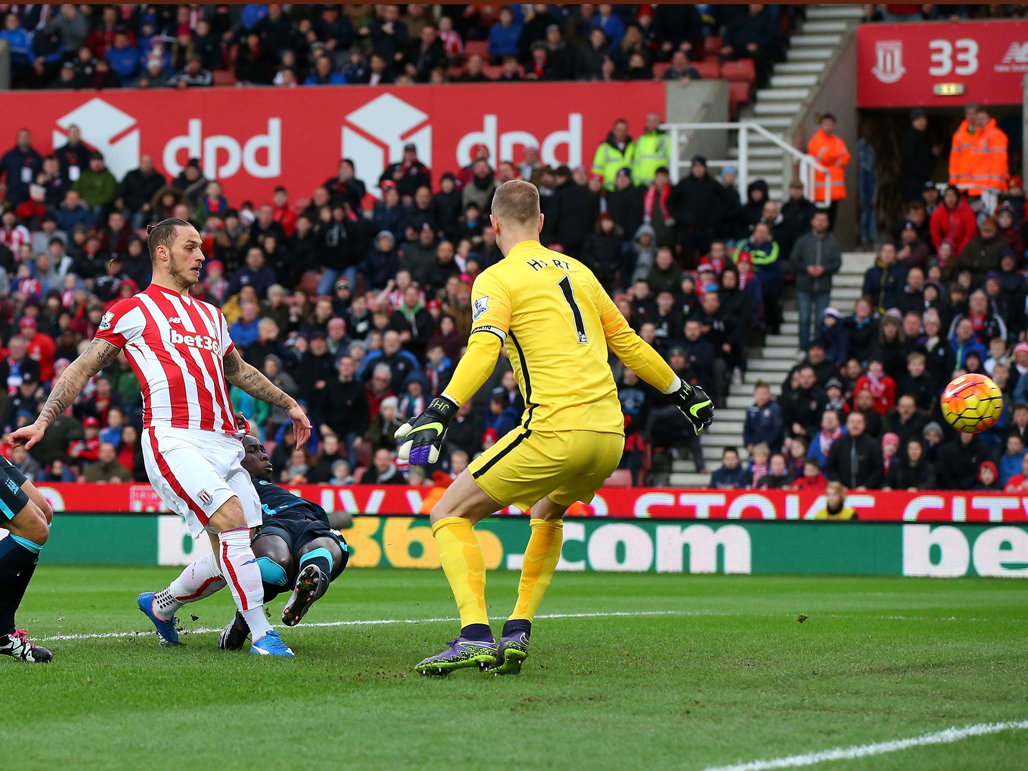 Marko Arnautovic scores the opener for Stoke against Manchester City