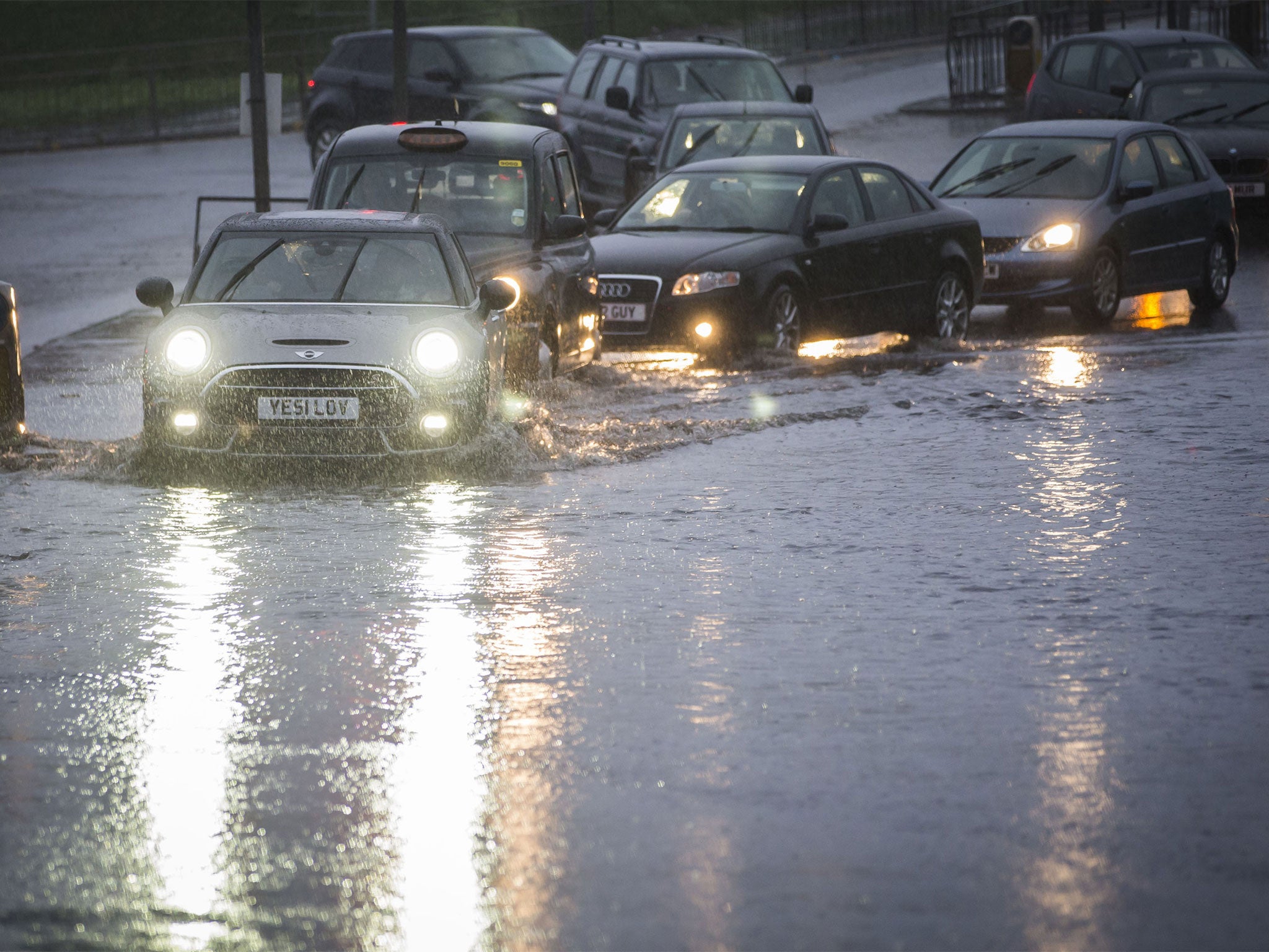 Local flooding on a road in Glasgow , Scotland