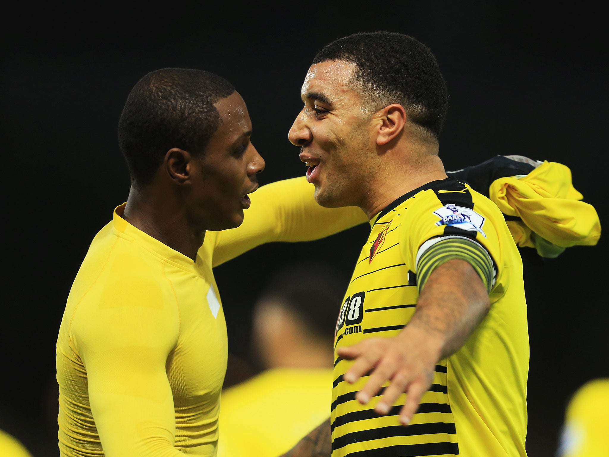 Odion Ighalo and Troy Deeney celebrate after the former scores for Watford