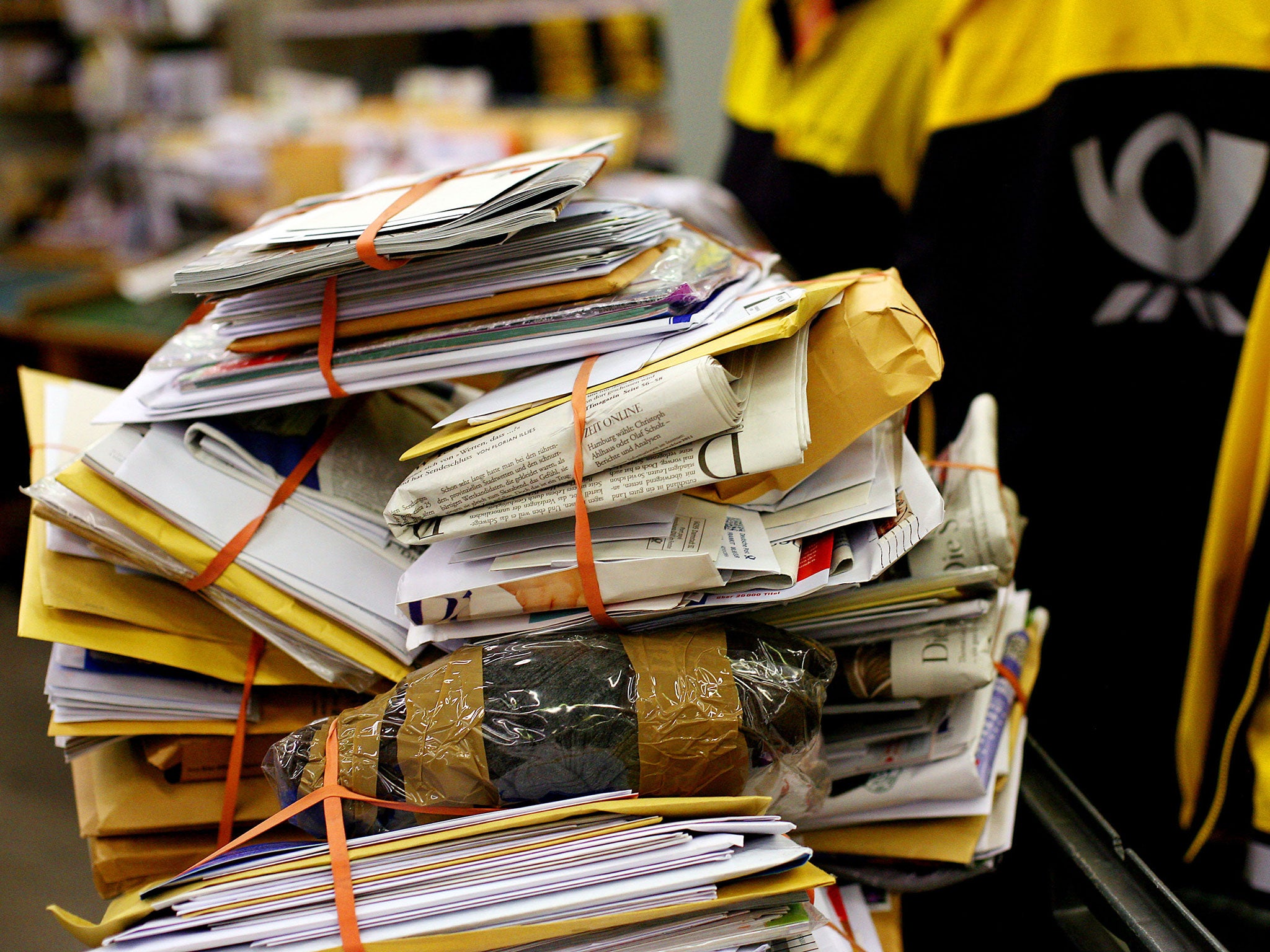 Letters piled up at the letter sorting center of German logistics giant Deutsche Post in Cologne, western Germany.