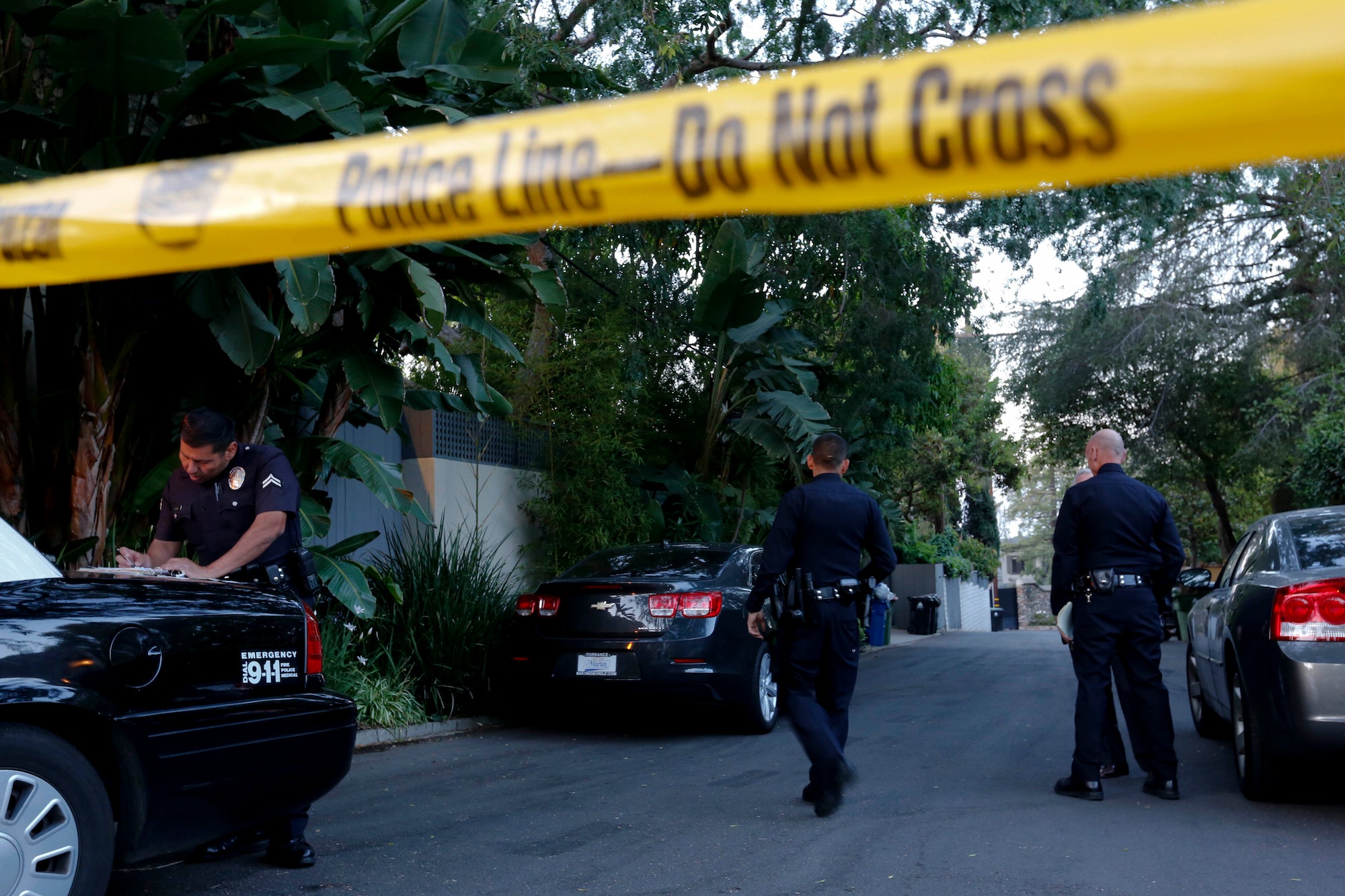 Police occupy a crime scene.