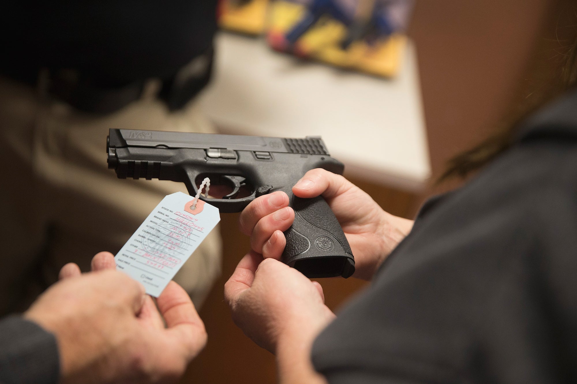 A customer checks out a gun in Ferguson, Missouri.