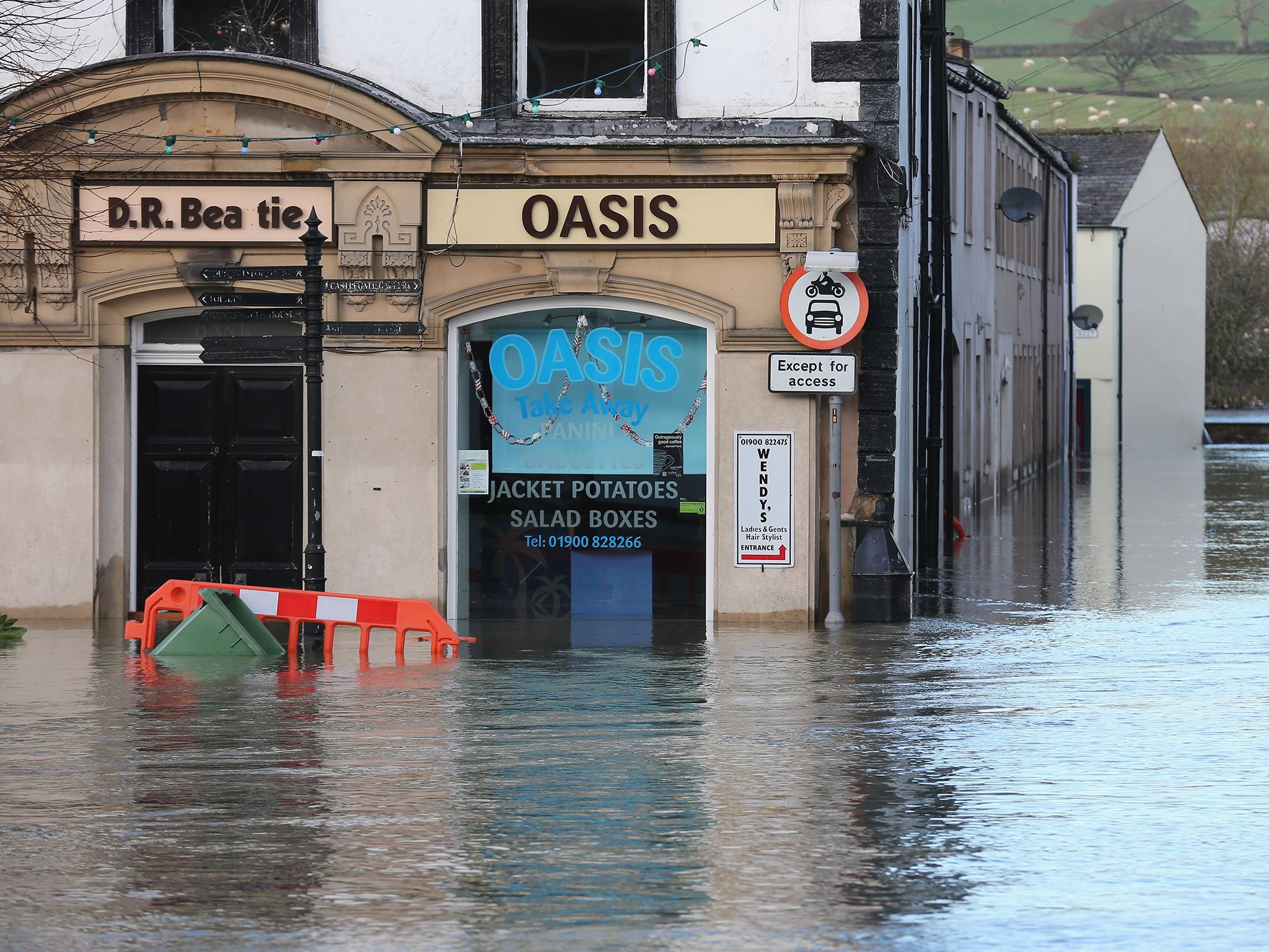 Floods like this one blighting the market town of Cockermouth are becoming more common in Britain