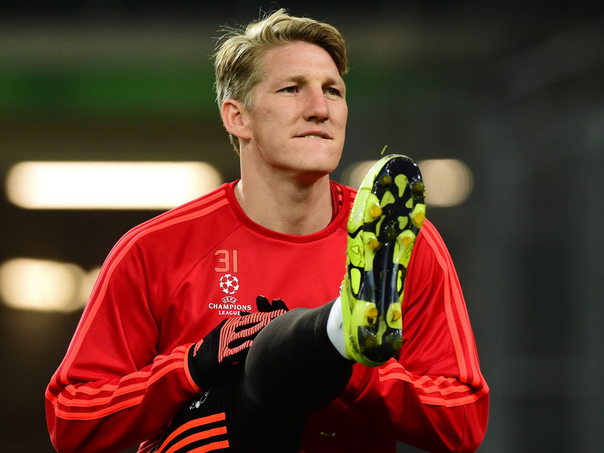 Bastian Schweinsteiger warms up during Manchester United training