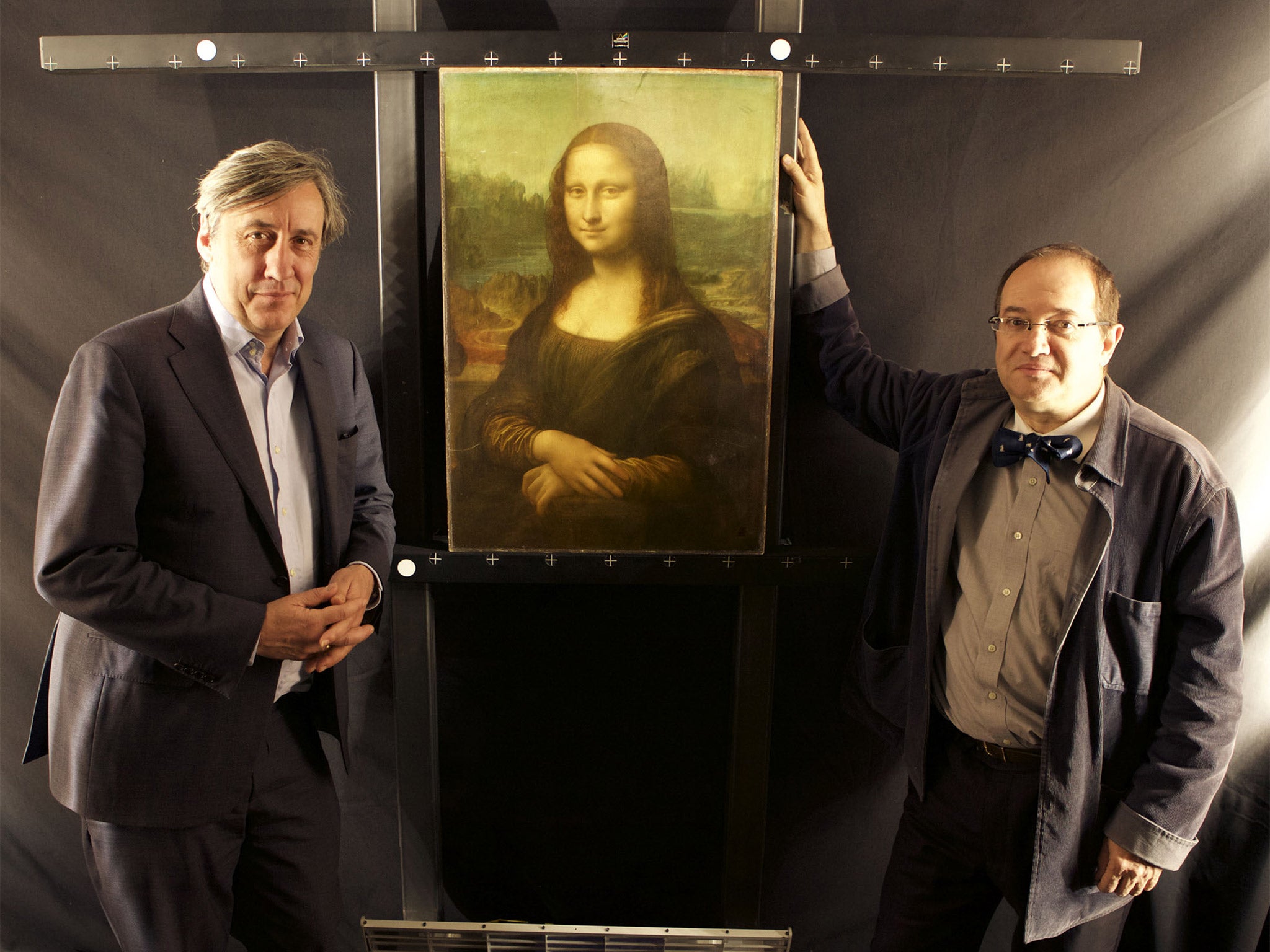 Pascal Cotte, right, and Andrew Graham-Dixon, with The Mona Lisa