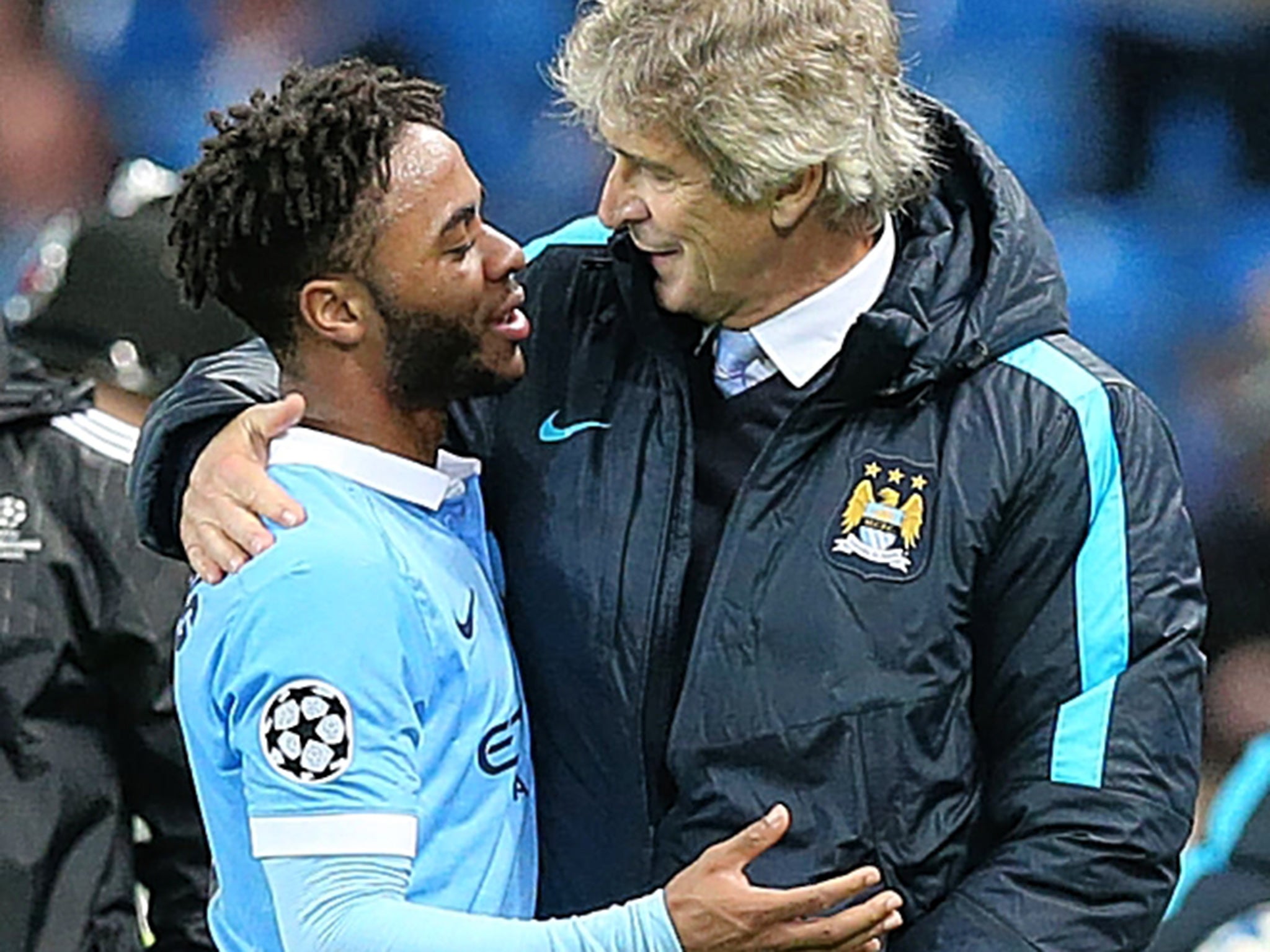 Raheem Sterling embraces City manager Manuel Pellegrini