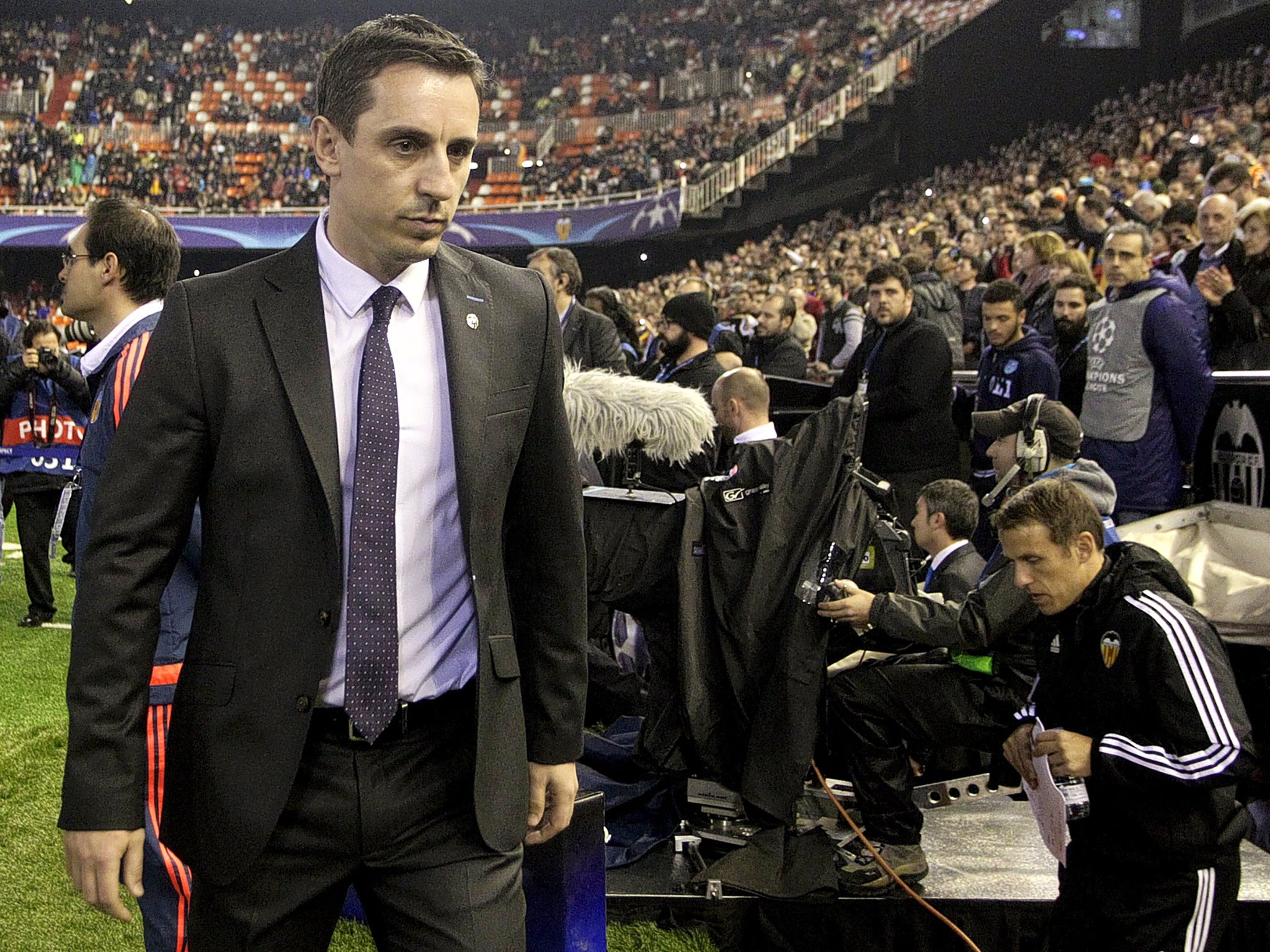 &#13;
Gary Neville will stay at Valencia until the job is done&#13;