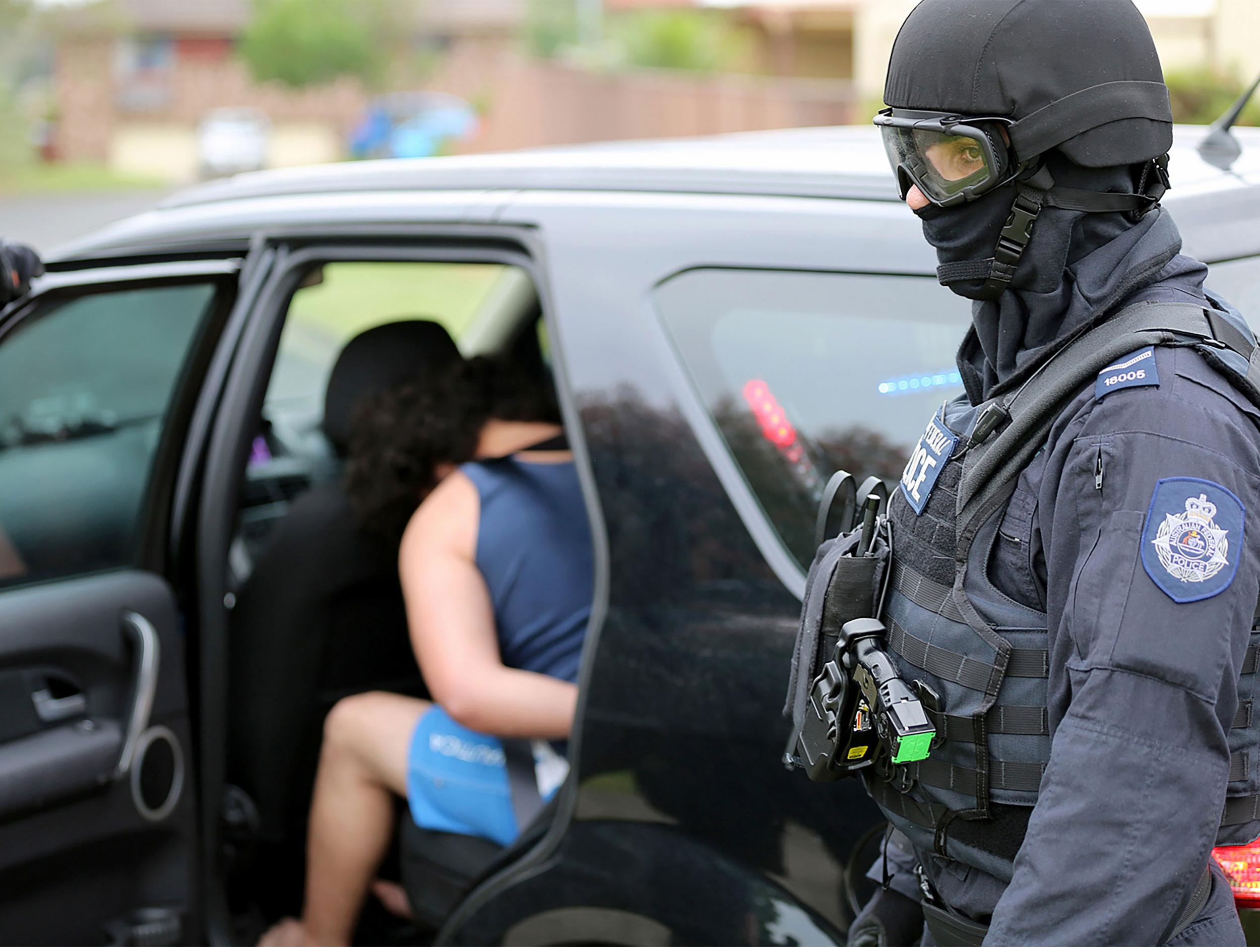 Five people have been arrested in connection with planning a terrorist act in the Australian capital