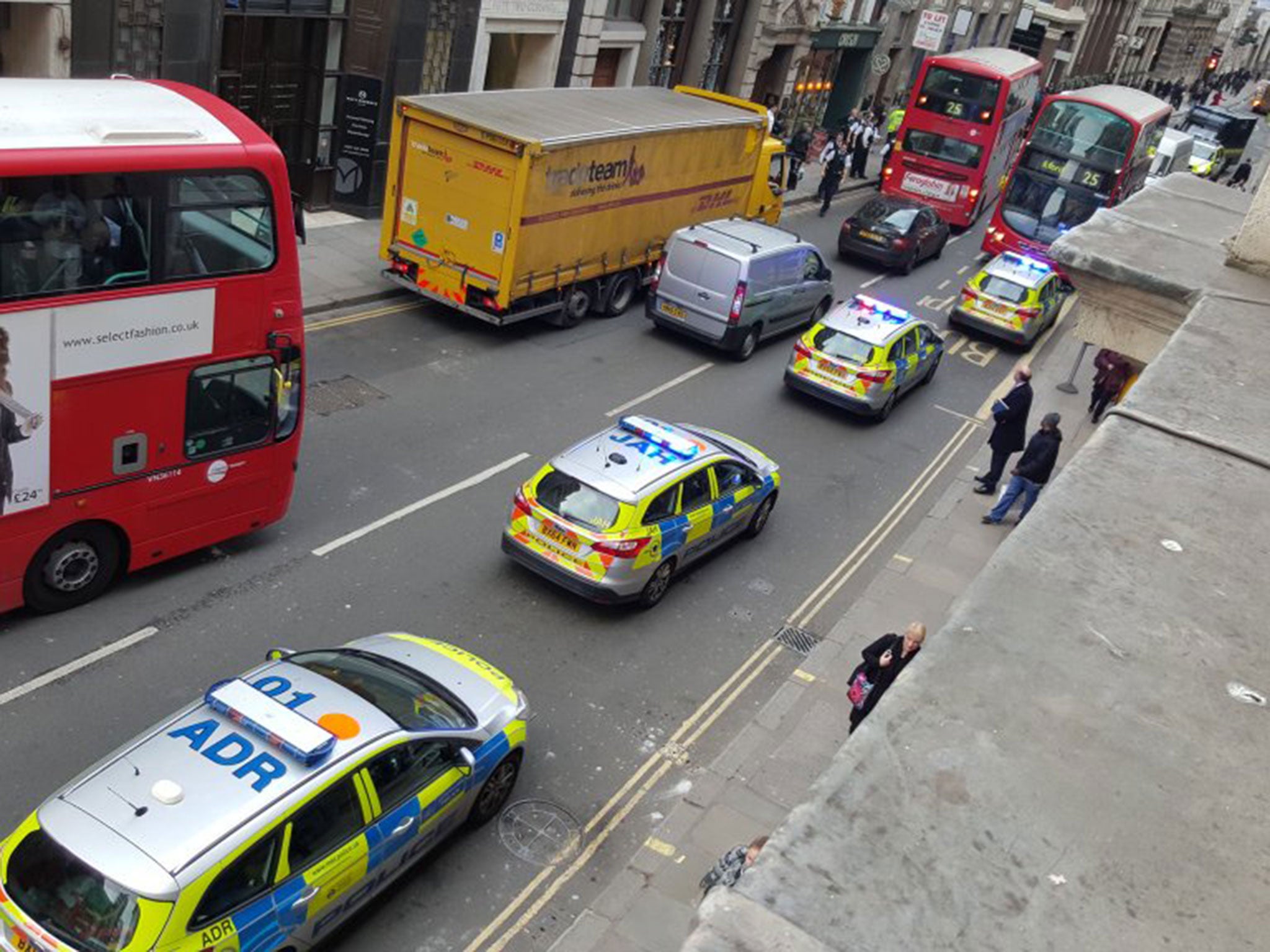 Dom Graham photographed the scene as the bus was surrounded from his office window