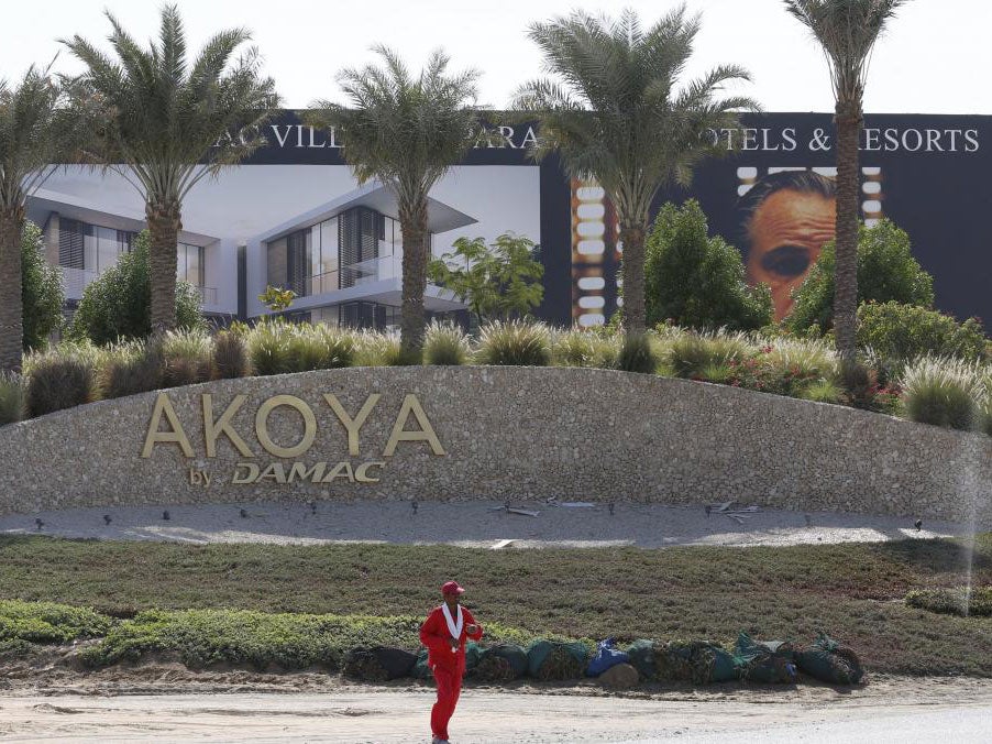 A view shows the signboard after the removal of the Trump International Golf Club portion