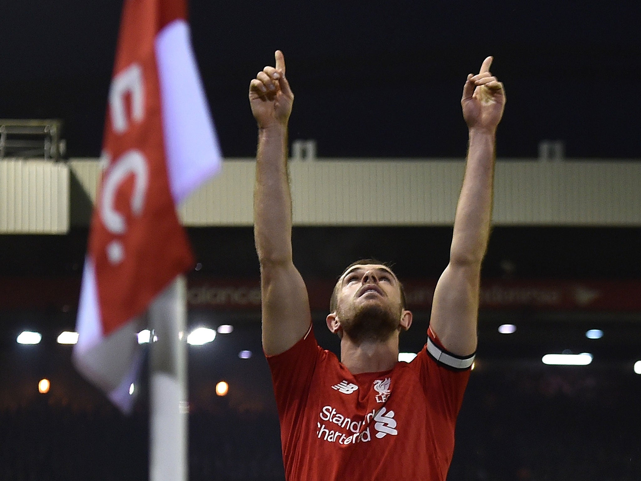 Jordan Henderson celebrates giving Liverpool the lead against West Brom