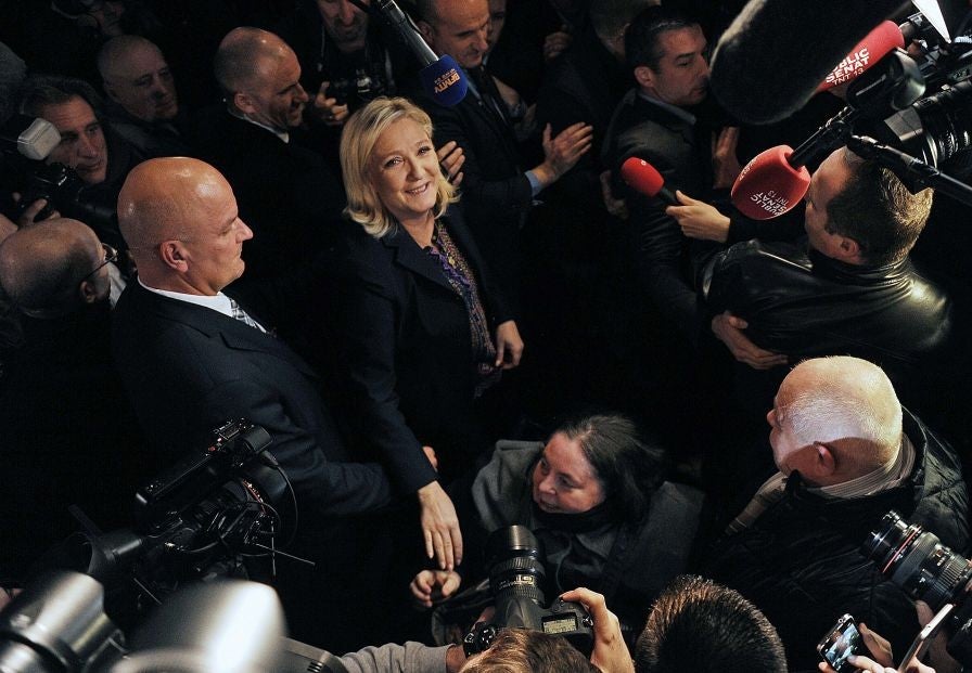 Le Pen remained upbeat even after the news of her party's failure came in (AFP)