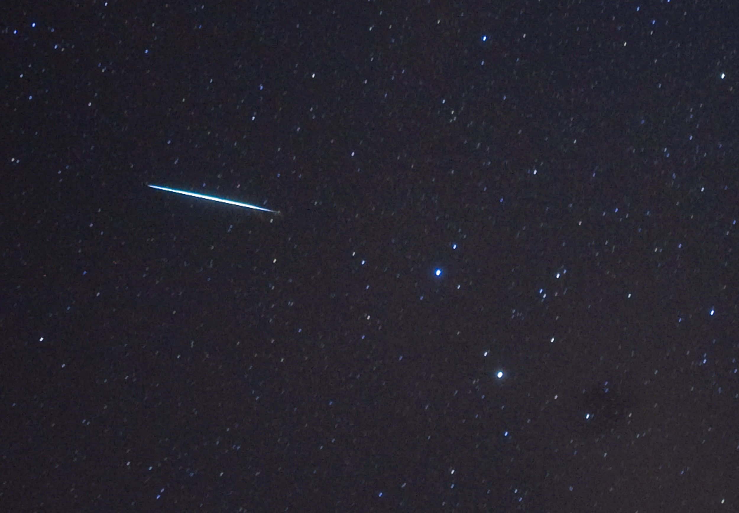 A Geminid meteor enters the Earth's atmosphere above New York