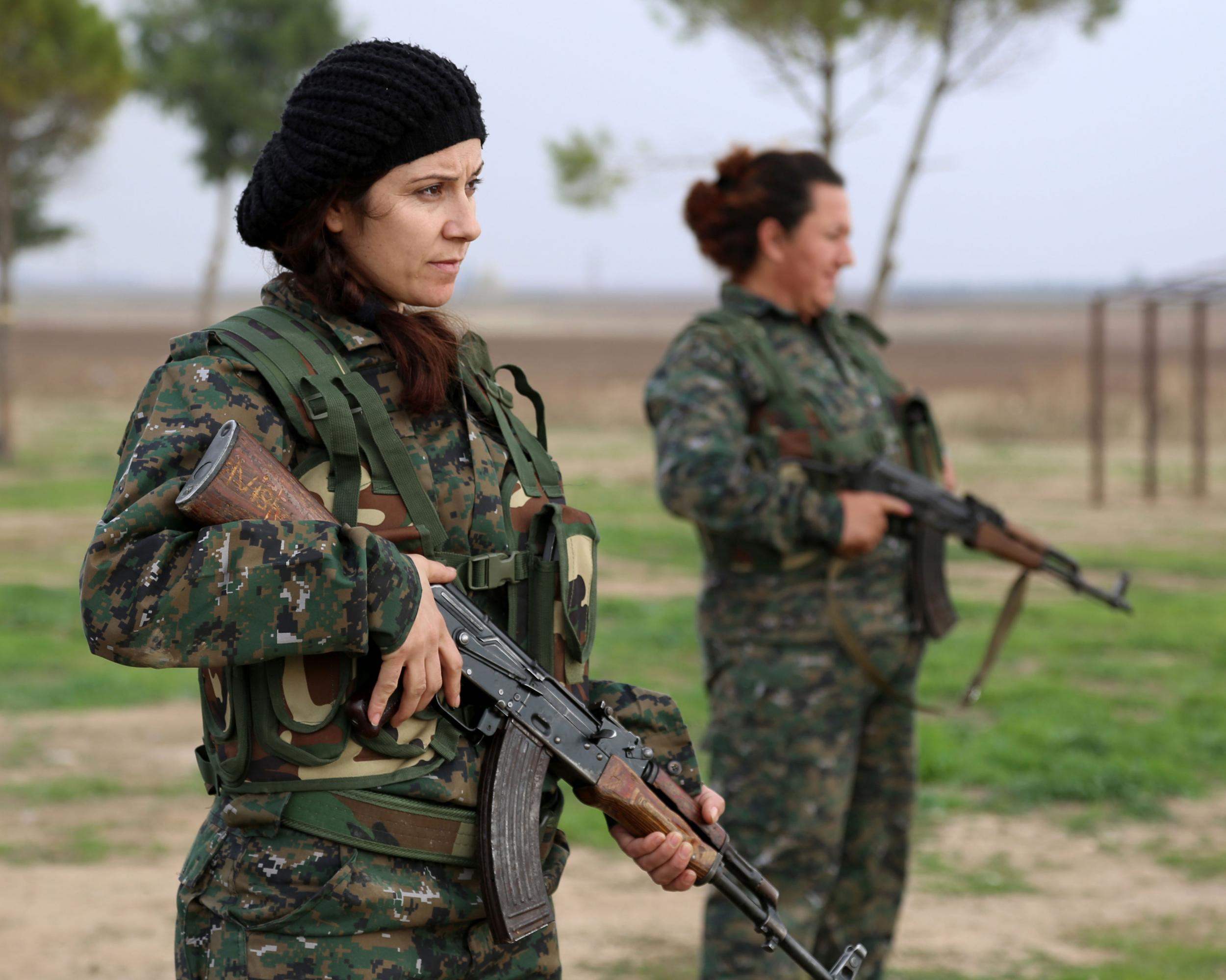 December 2015 file photo of Kurdish-trained Syriac Christian women fighting Isis