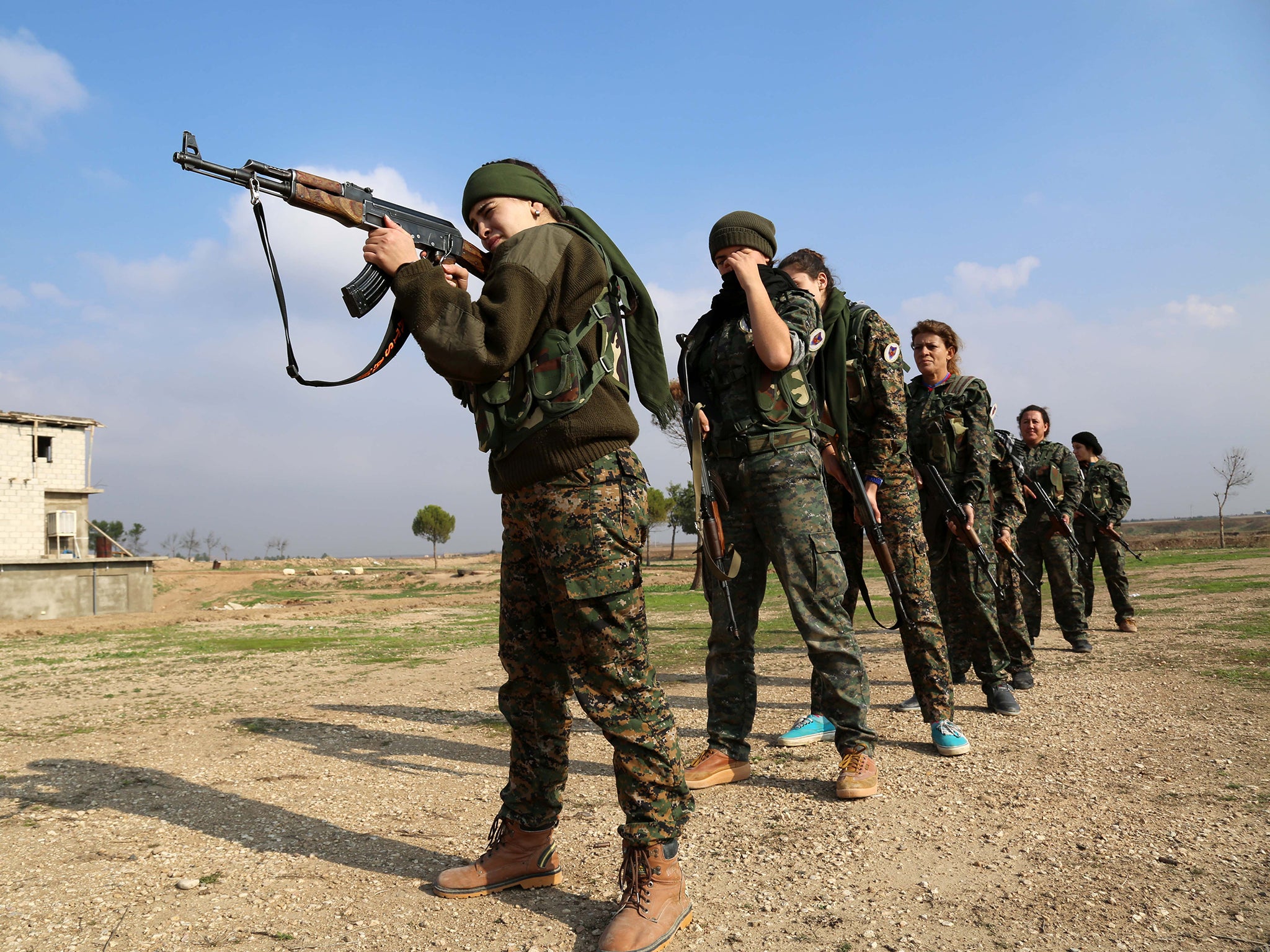 Members of the battalion called the "Female Protection Forces of the Land Between the Two Rivers" fighting Isis, take part in a training