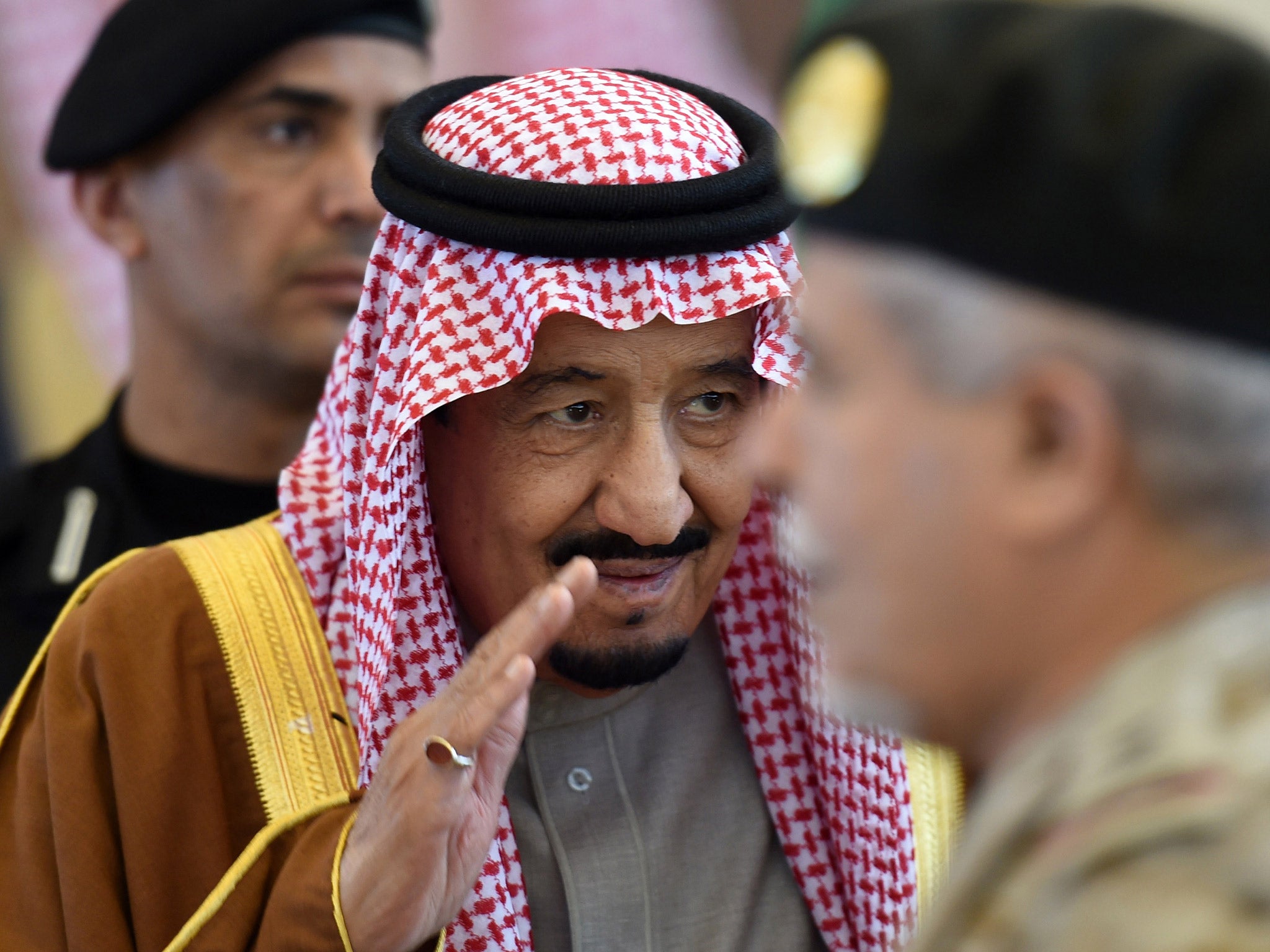 King Salman bin Abdulaziz greets military officers at a recent summit in Riyadh