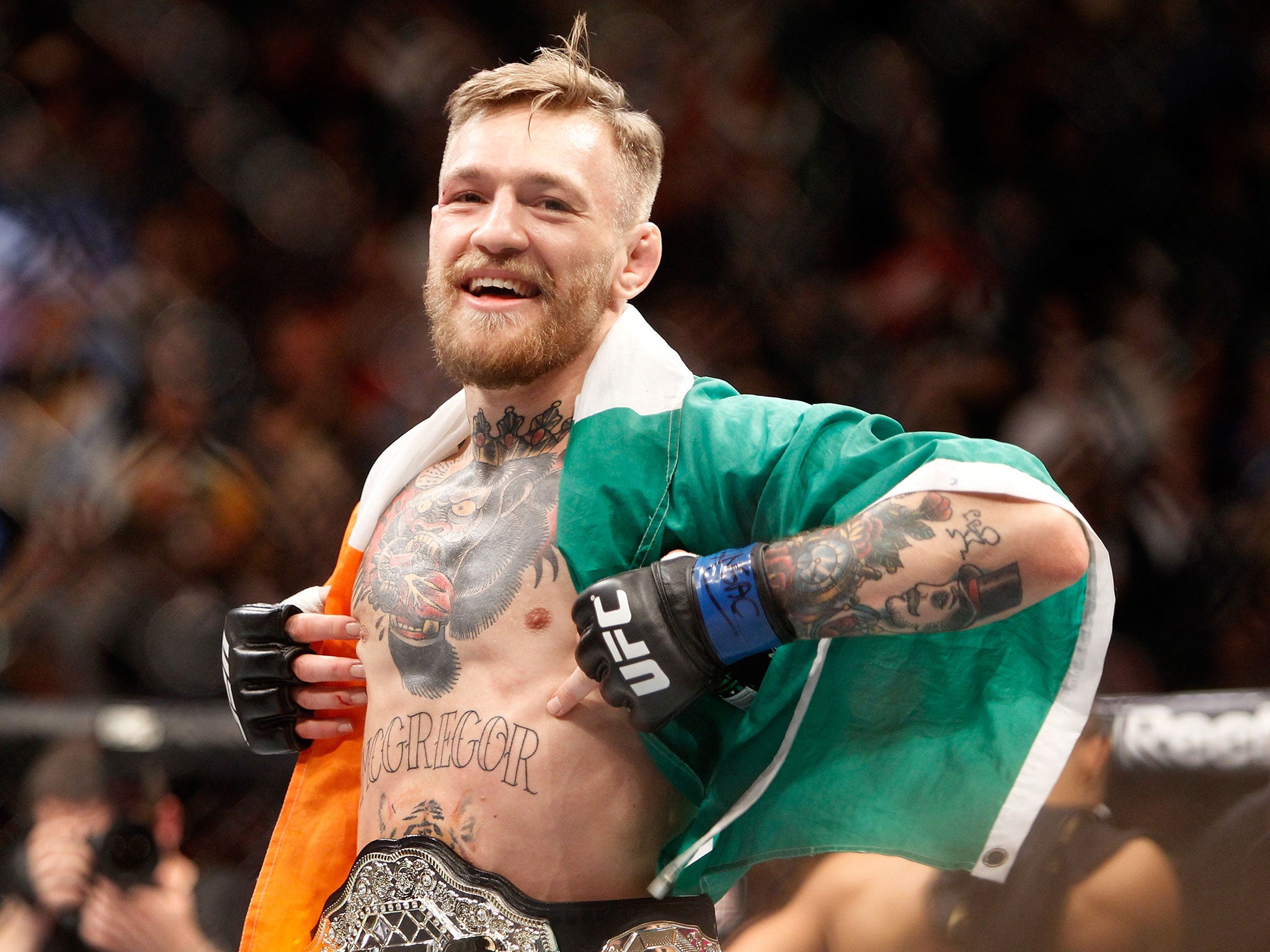 McGregor celebrates his UFC 194 victory over Aldo