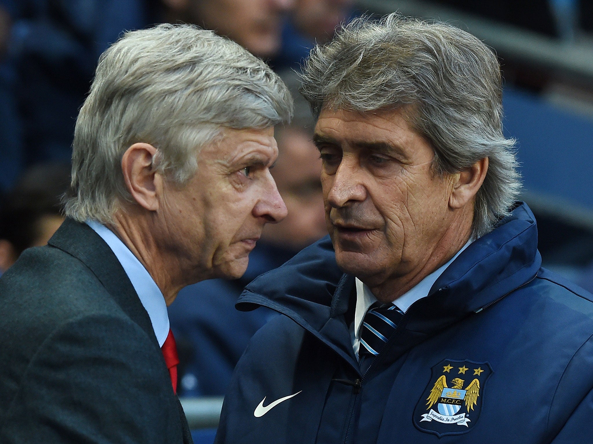 Arsenal manager Arsene Wenger and Manchester City manager Manuel Pellegrini