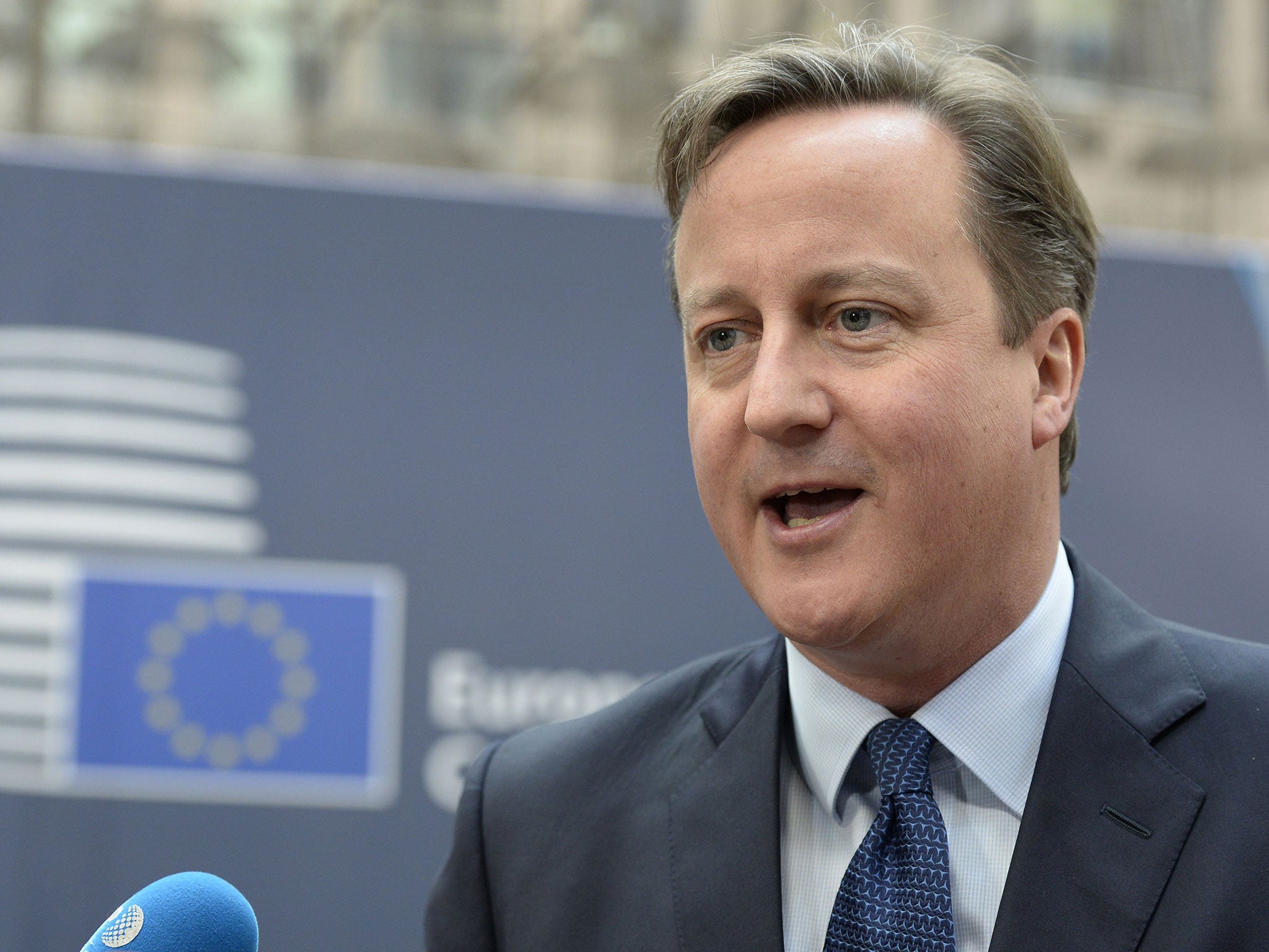 David Cameron arrives at the European Council in Brussels to take part in the final European Union (EU) summit of the year