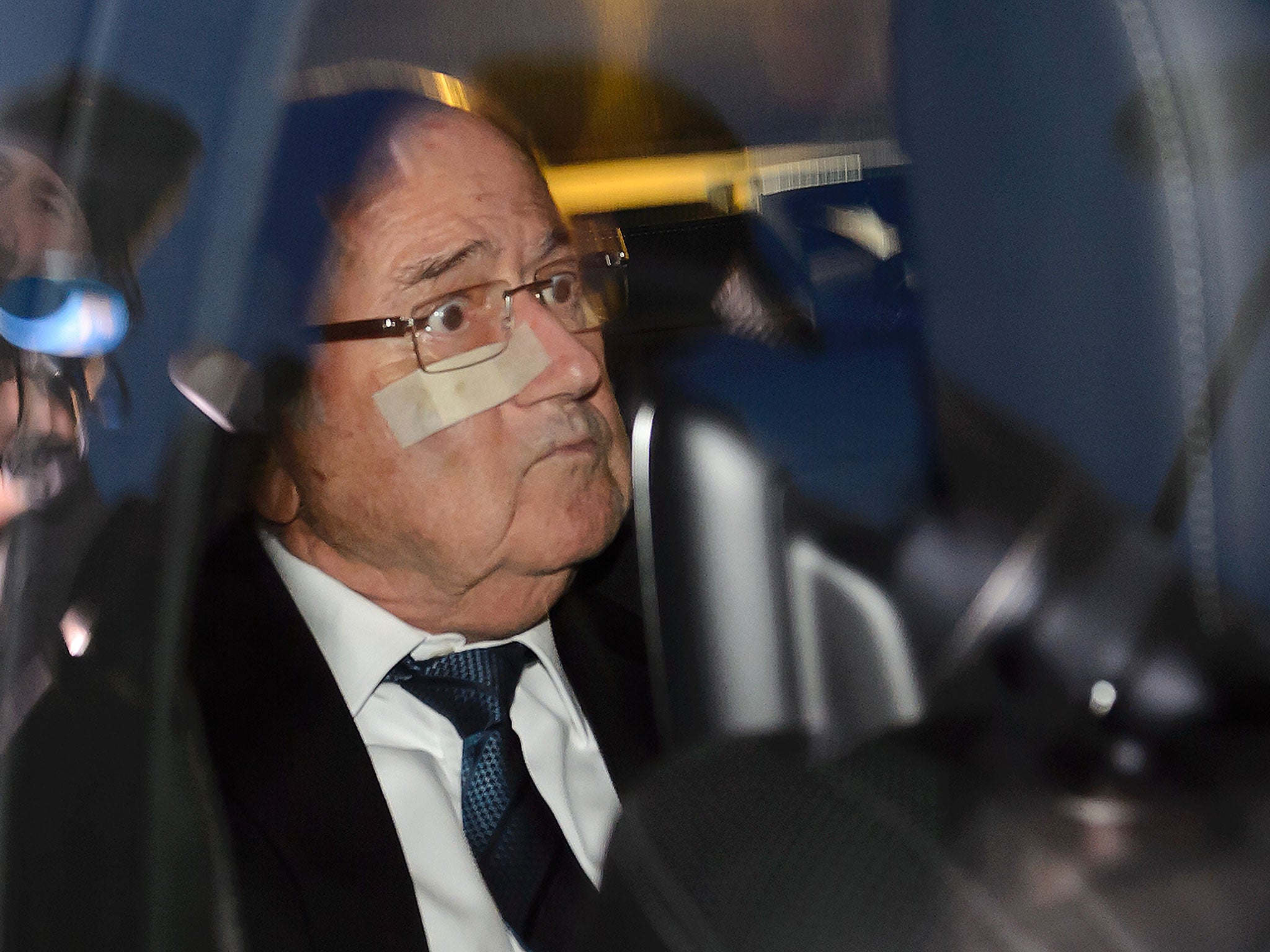 Sepp Blatter appeared before the ethics committee with a bandaged cheek