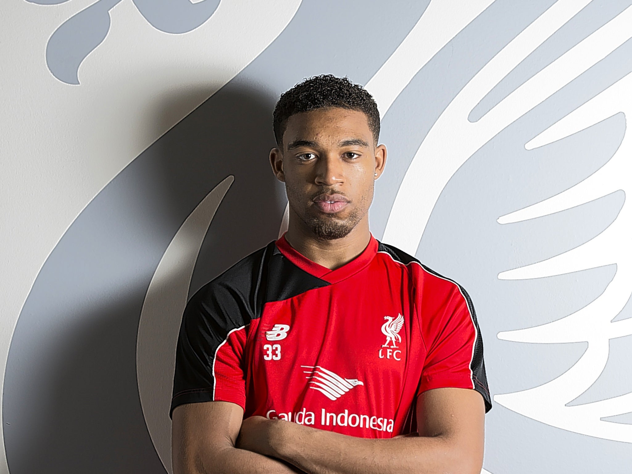 Jordon Ibe receiving a hug from Jürgen Klopp