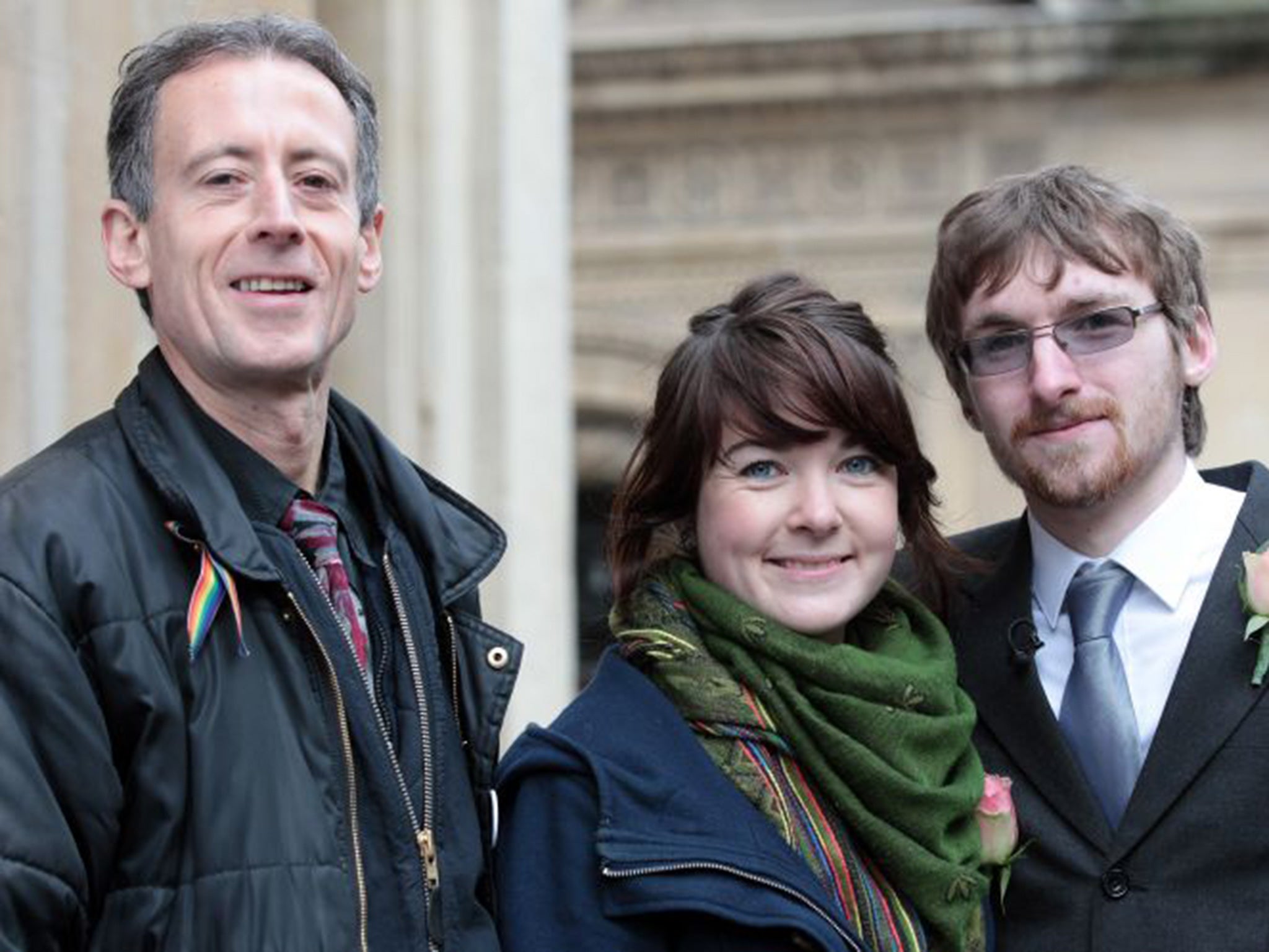 Heterosexual couple, Ian Goggin and Kristin Skarsholt pose with Peter Tatchell, after being refused a civil partnership