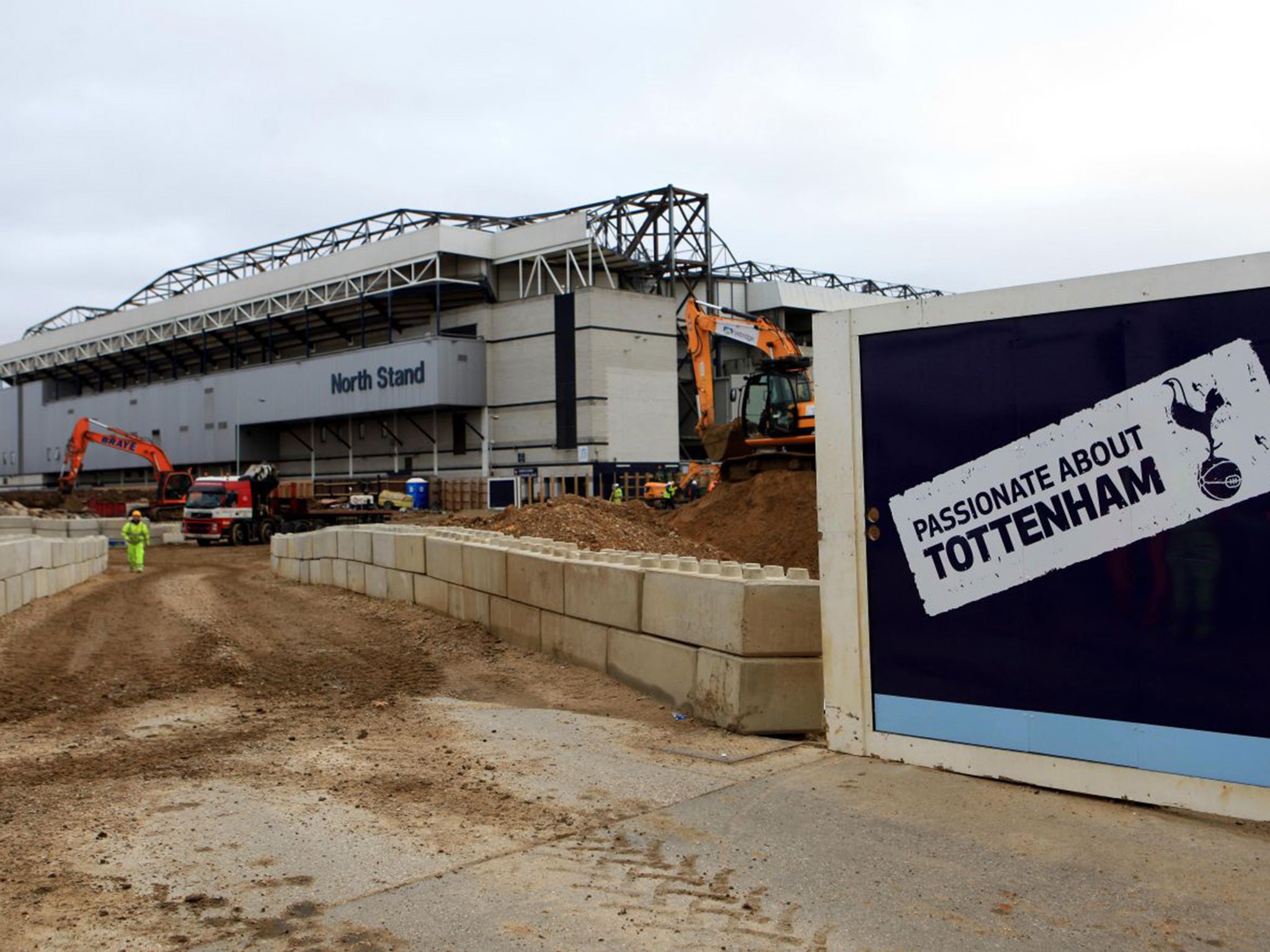 Builders work on the preparations for the new 61,00-capacity White Hart Lane, which Tottenham hope to open in 2018