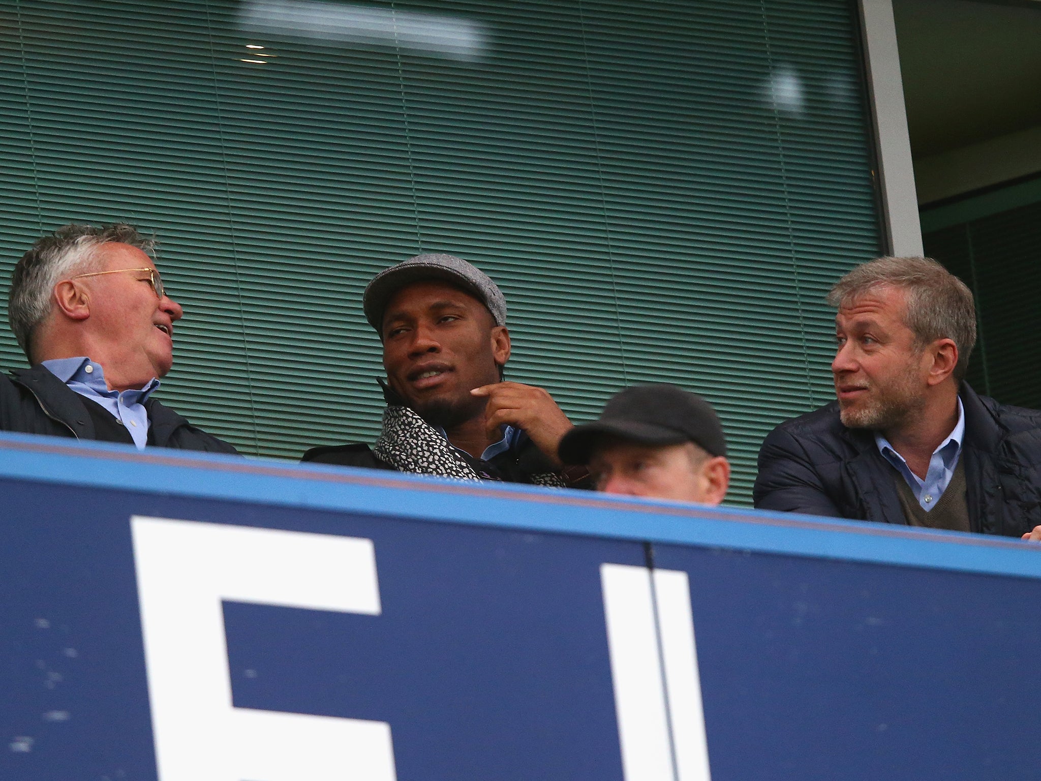 Guus Hiddink, Didier Drogba and Roman Abramovich in the Russian's box at the weekend