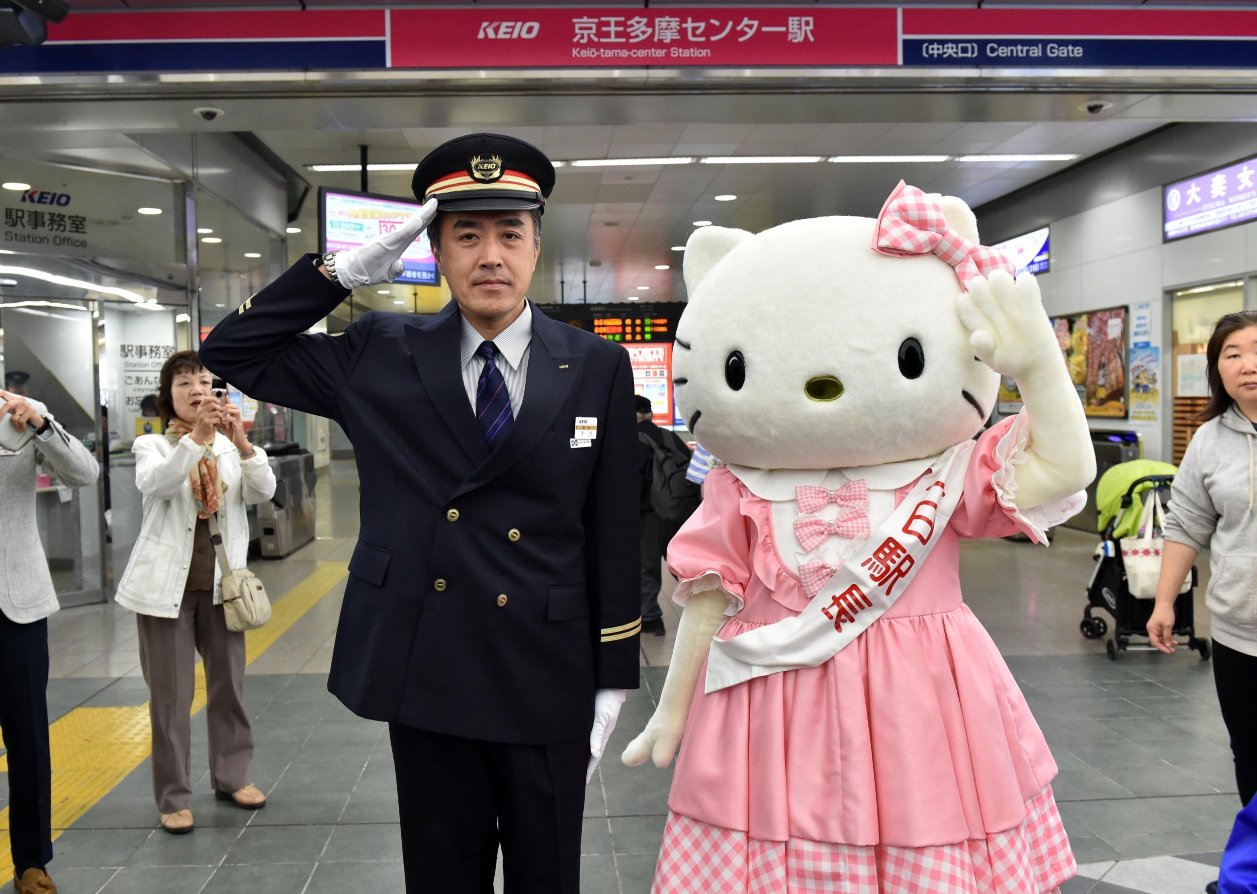 Hello Kitty accepts the honour of being named one-day stationmaster of the Keio Tama-Center Station in west Tokyo in 2014