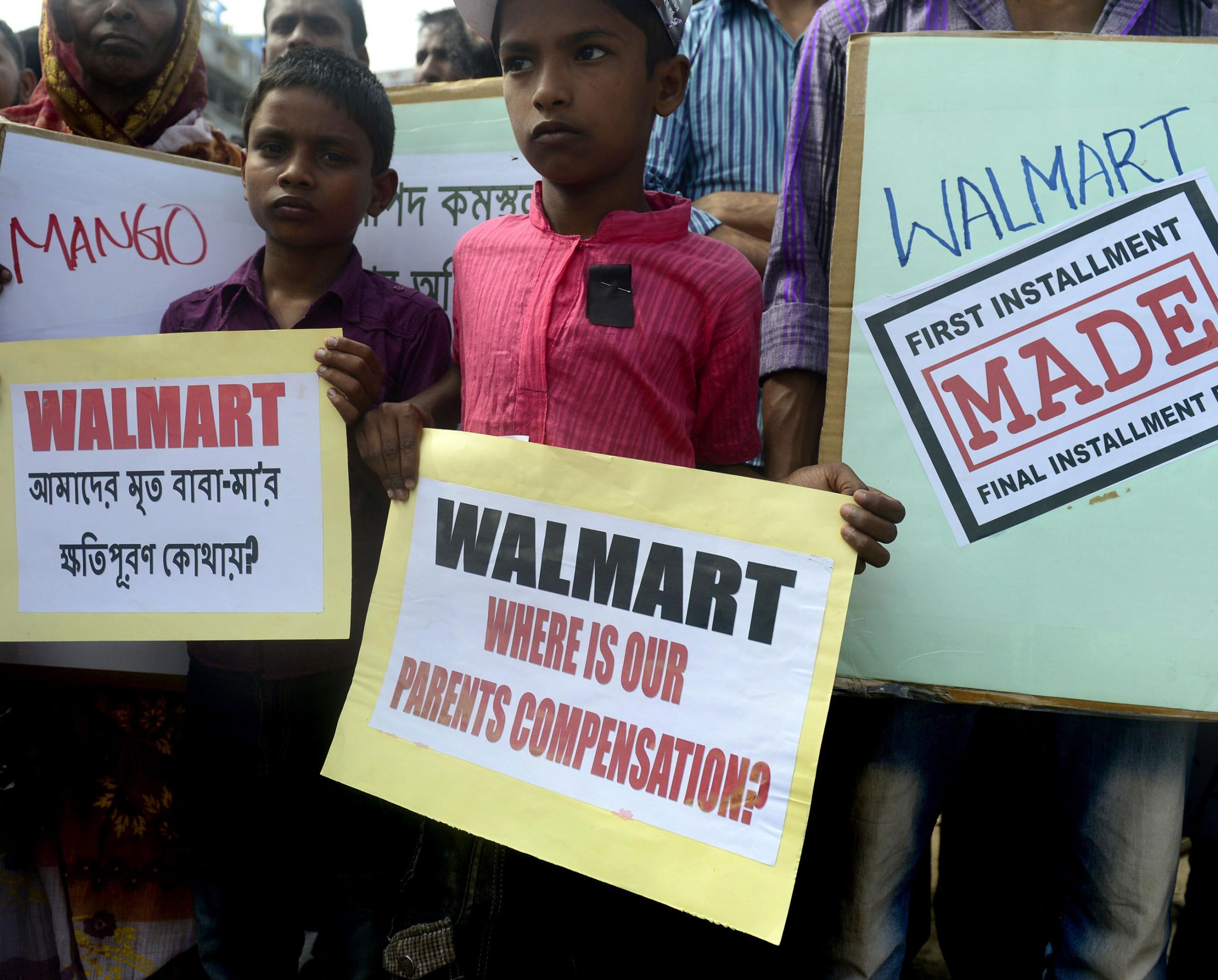 Children marking the second anniversary of the disaster in April asking the big retailers when the money they promised would arrive