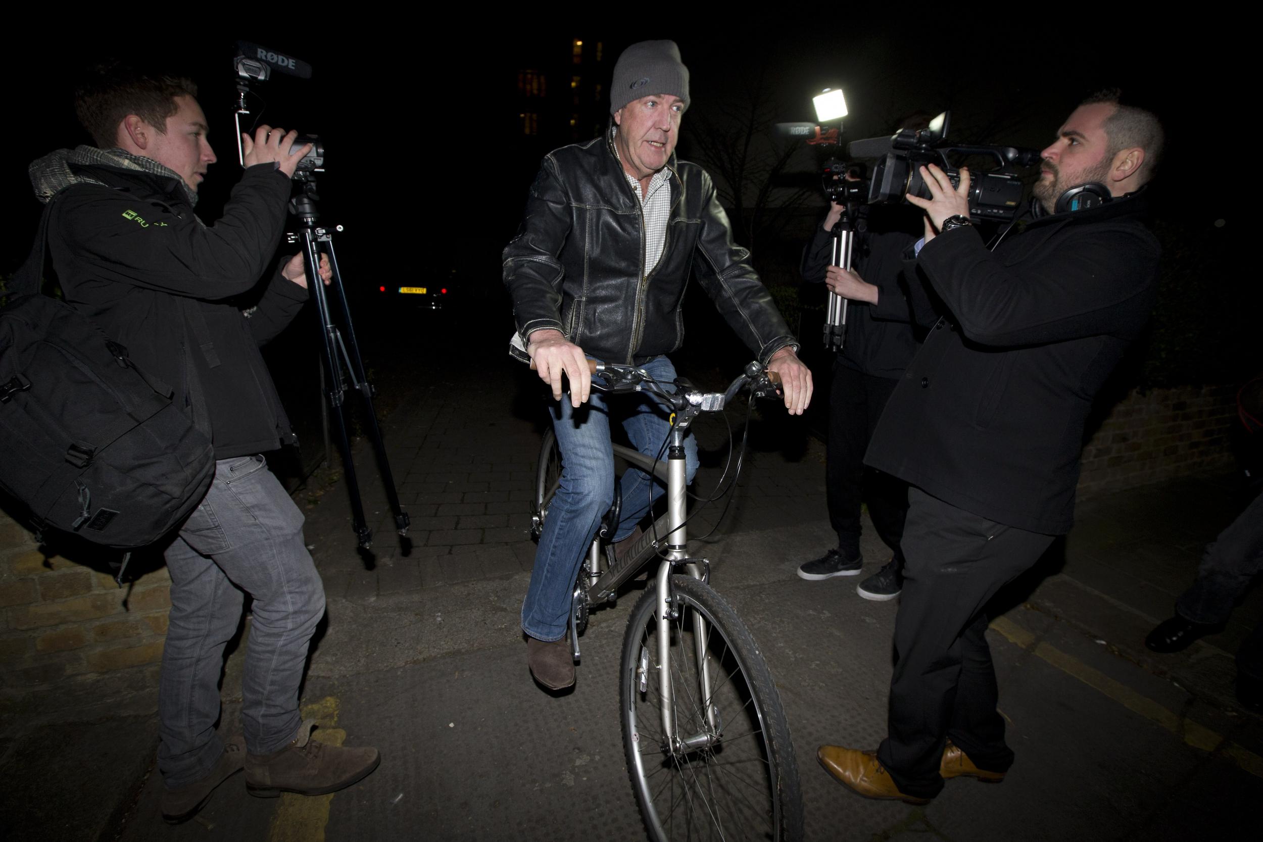 Jeremy Clarkson leaves his flat on a bicycle in west London