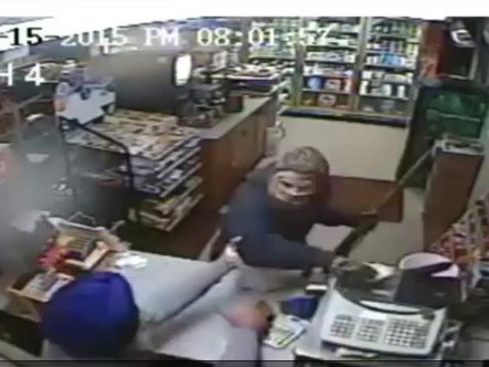 Armed robbery foiled by shop owner who threw shoe at gunman in New York