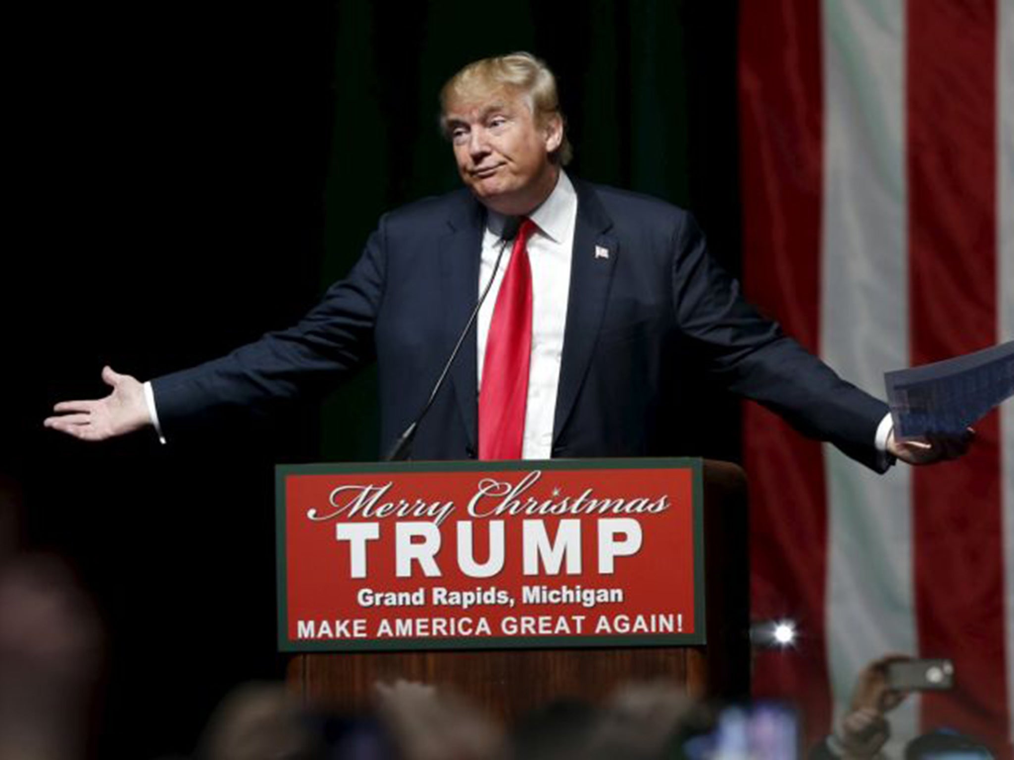 U.S. Republican presidential candidate Donald Trump addresses the crowd during a campaign rally in Grand Rapids, Michigan