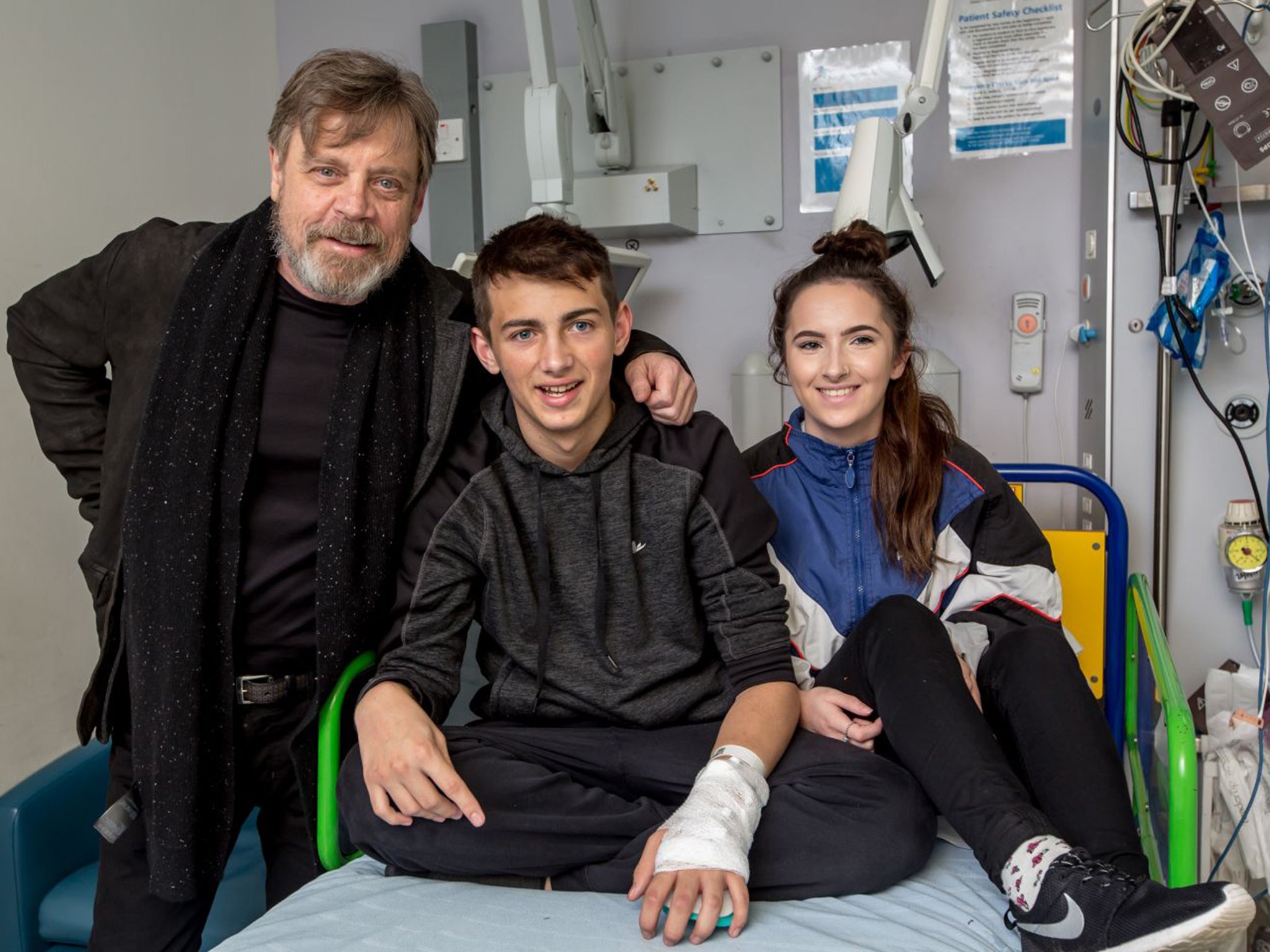 Mark Hamill, aka Luke Skywalker visits kids at Gt Ormond St Hospital. Pictured here with Coke Rayner 16 and friend Katie Leck 17