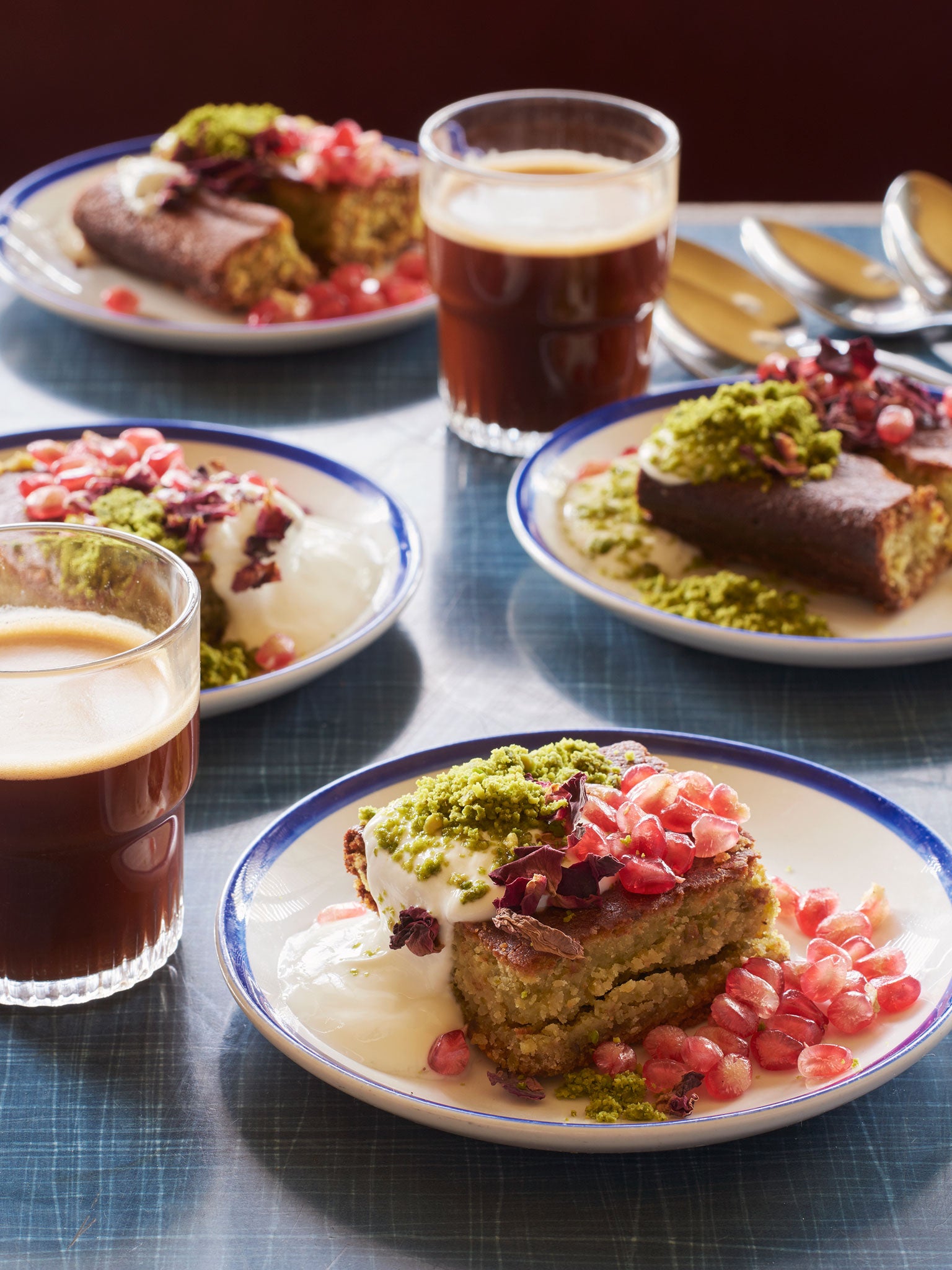 Rose and pistachio cake with pomegranate seeds