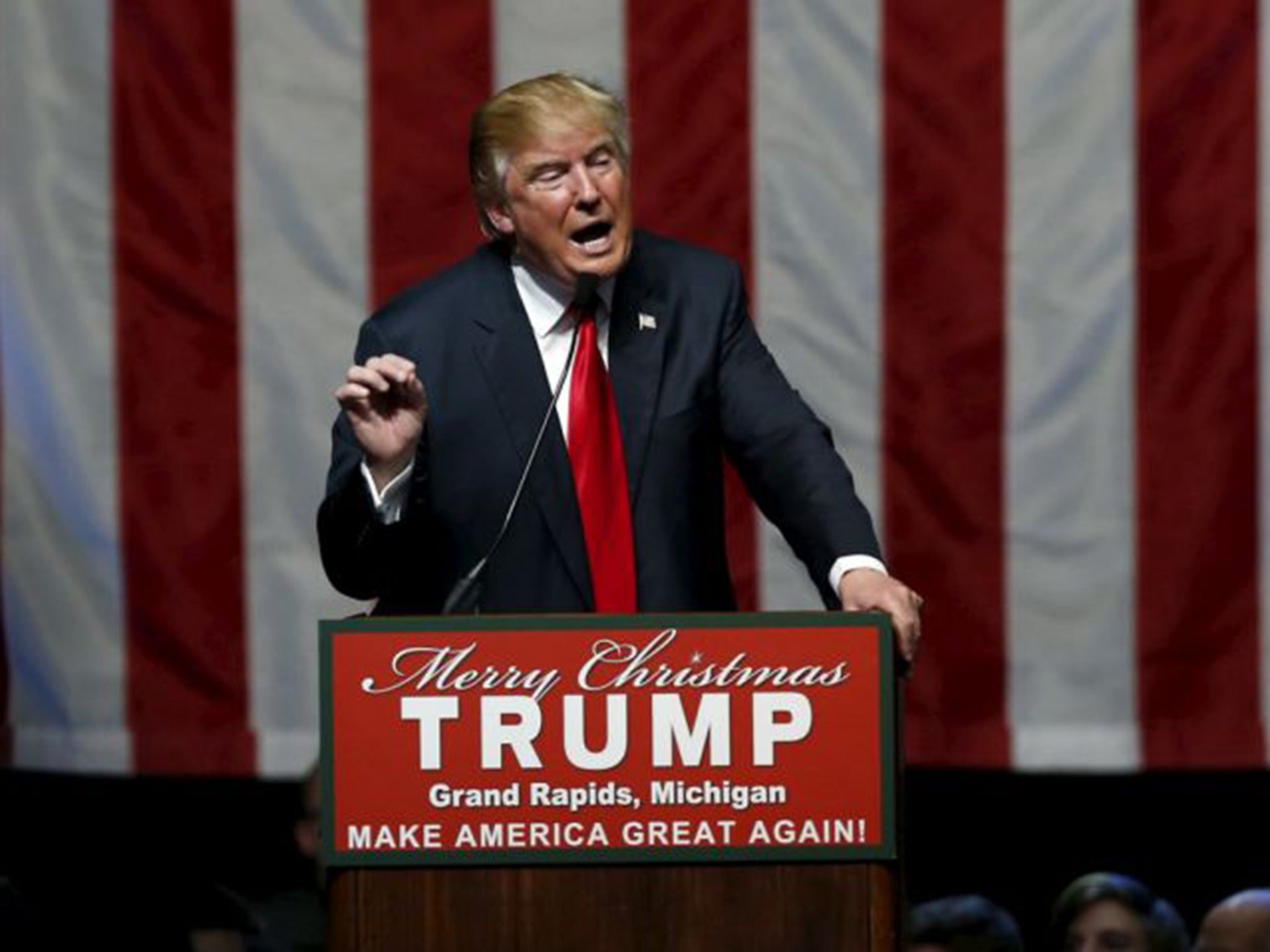 U.S. Republican presidential candidate Donald Trump addresses the crowd during a campaign rally in Grand Rapids, Michigan