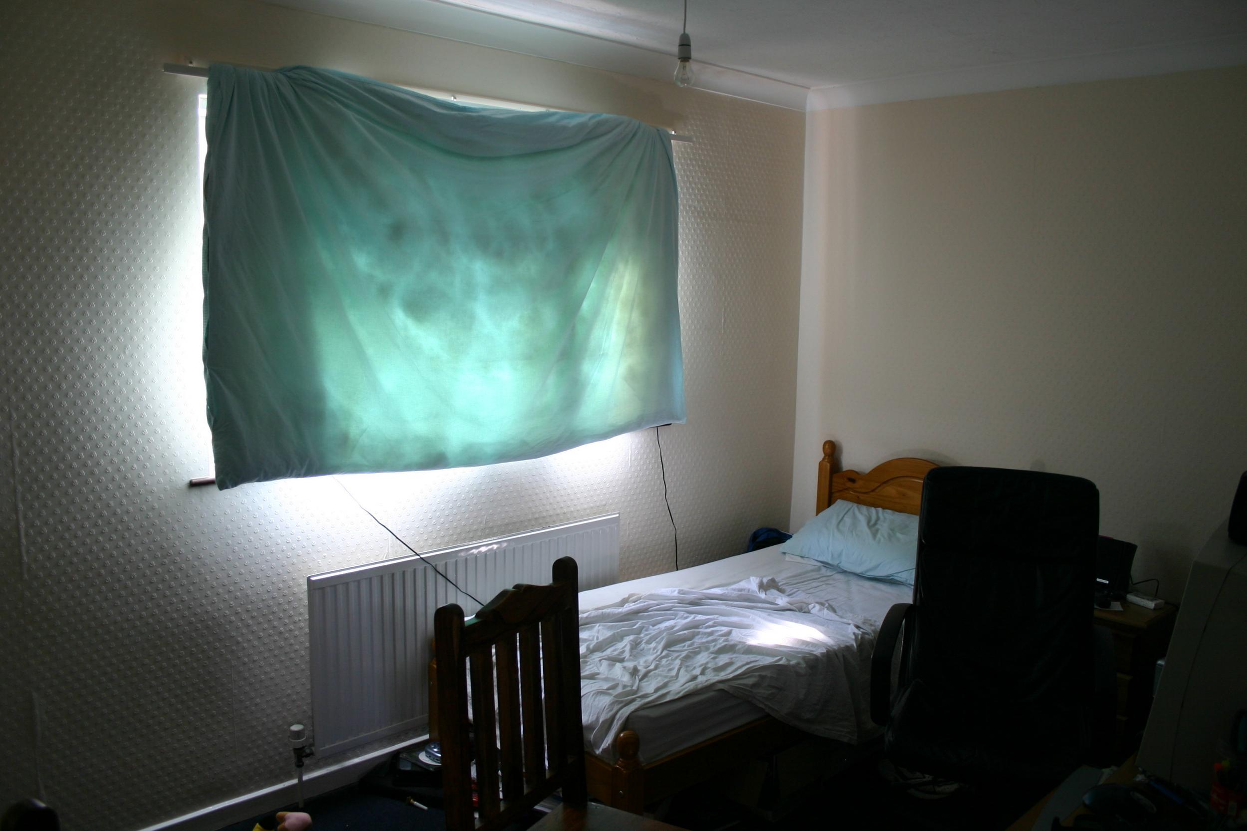 A towel being used as a curtain