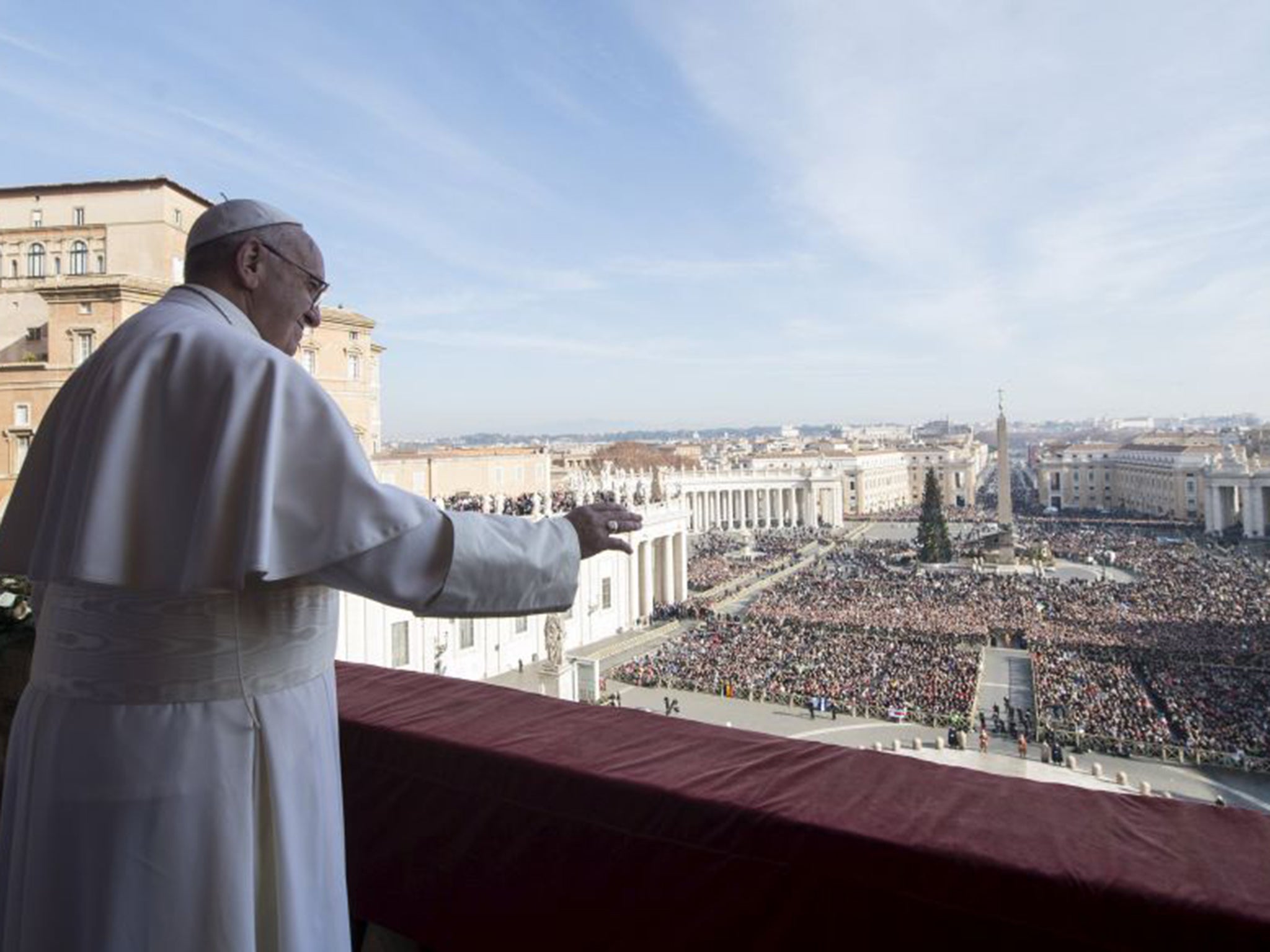 Pope Francis waves to pilgrims in St Peter’s Square