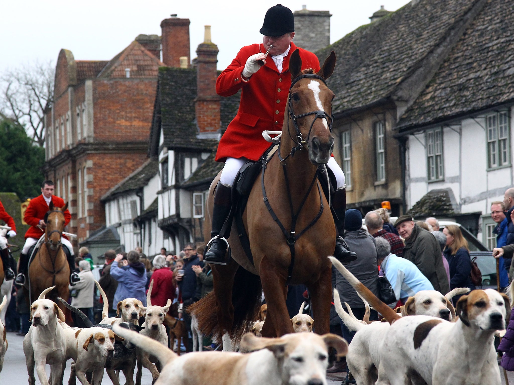 Avon Vale hunt making its way to the village of Laycock, Wiltshire