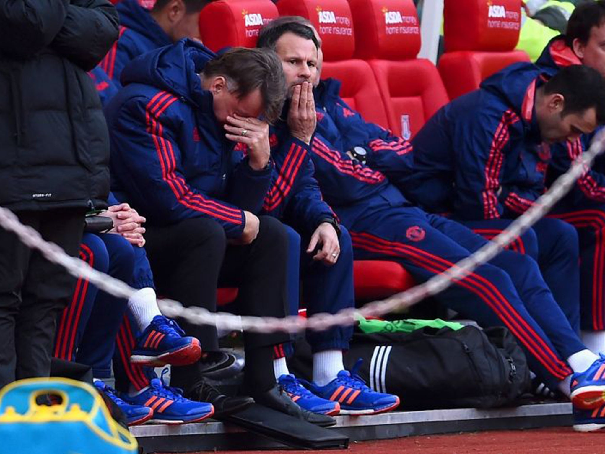 Van Gaal reacts in the dugout at the Britannia Stadium