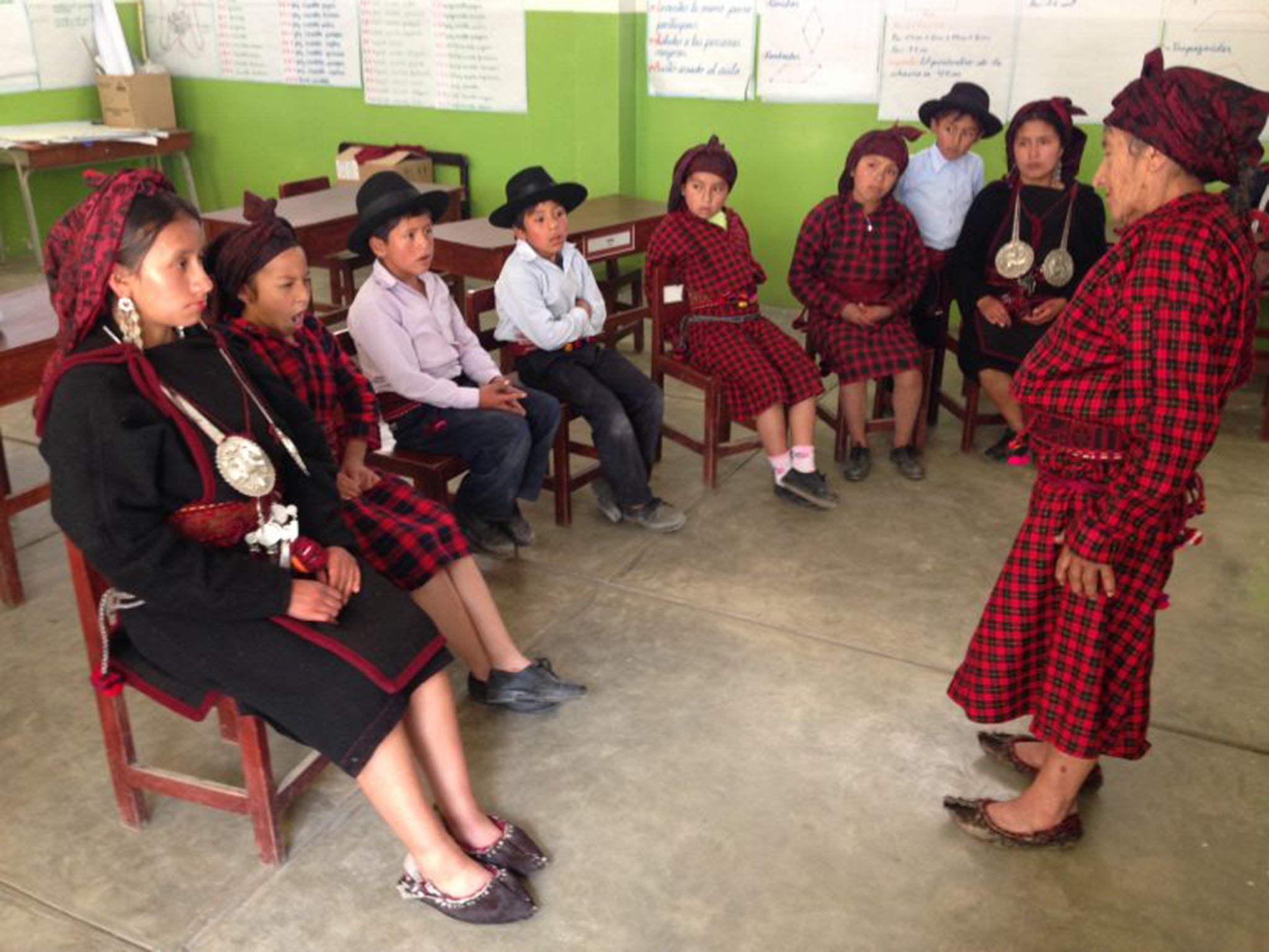 Rosalbino Valerio tells a Jaqaru fable to children at a primary school in Tupe