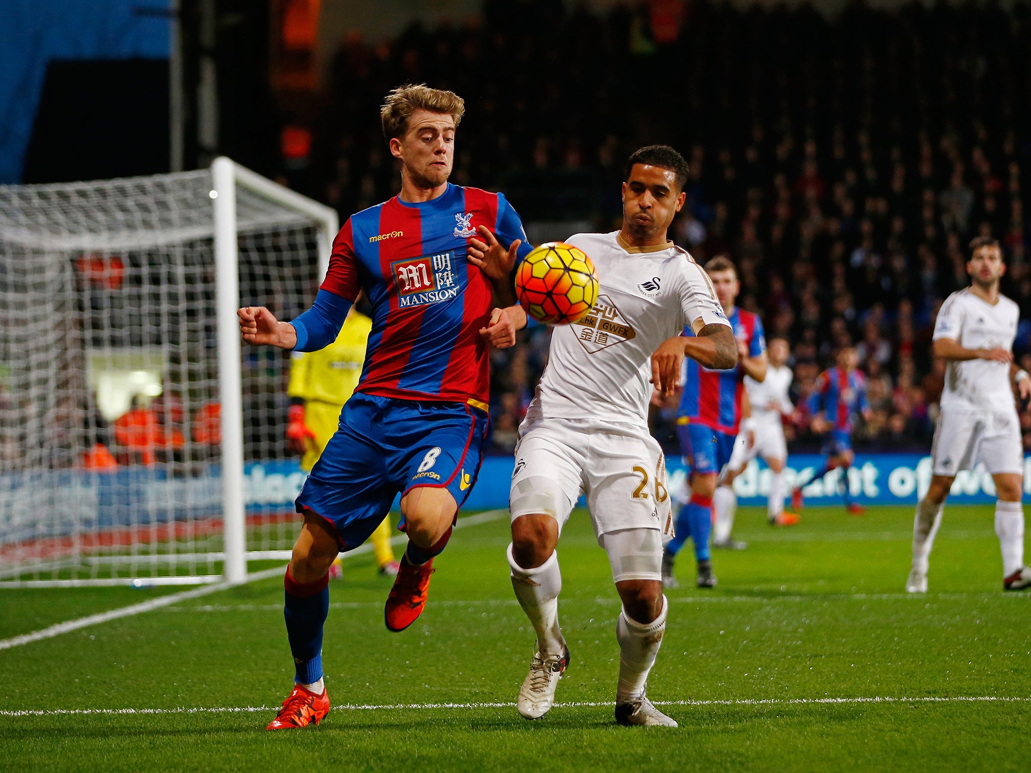 Patrick Bamford challenges Kyle Naughton for the ball