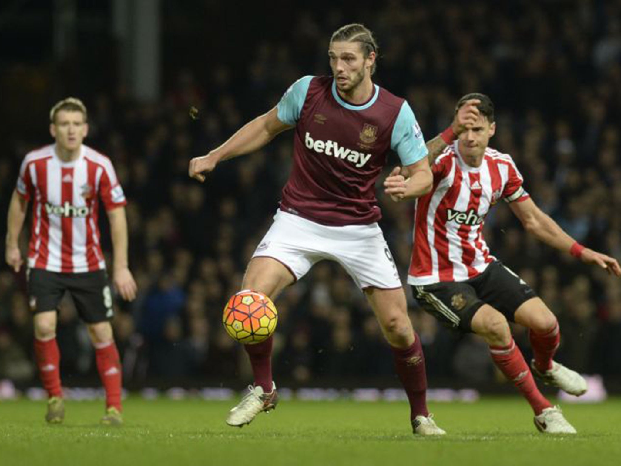 Andy Carroll holds up the ball for West Ham