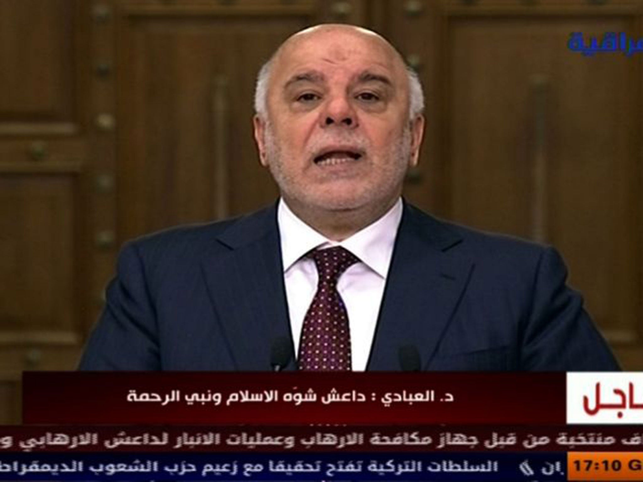 Iraqi Prime Minister Haider al-Abadi speaking on state television