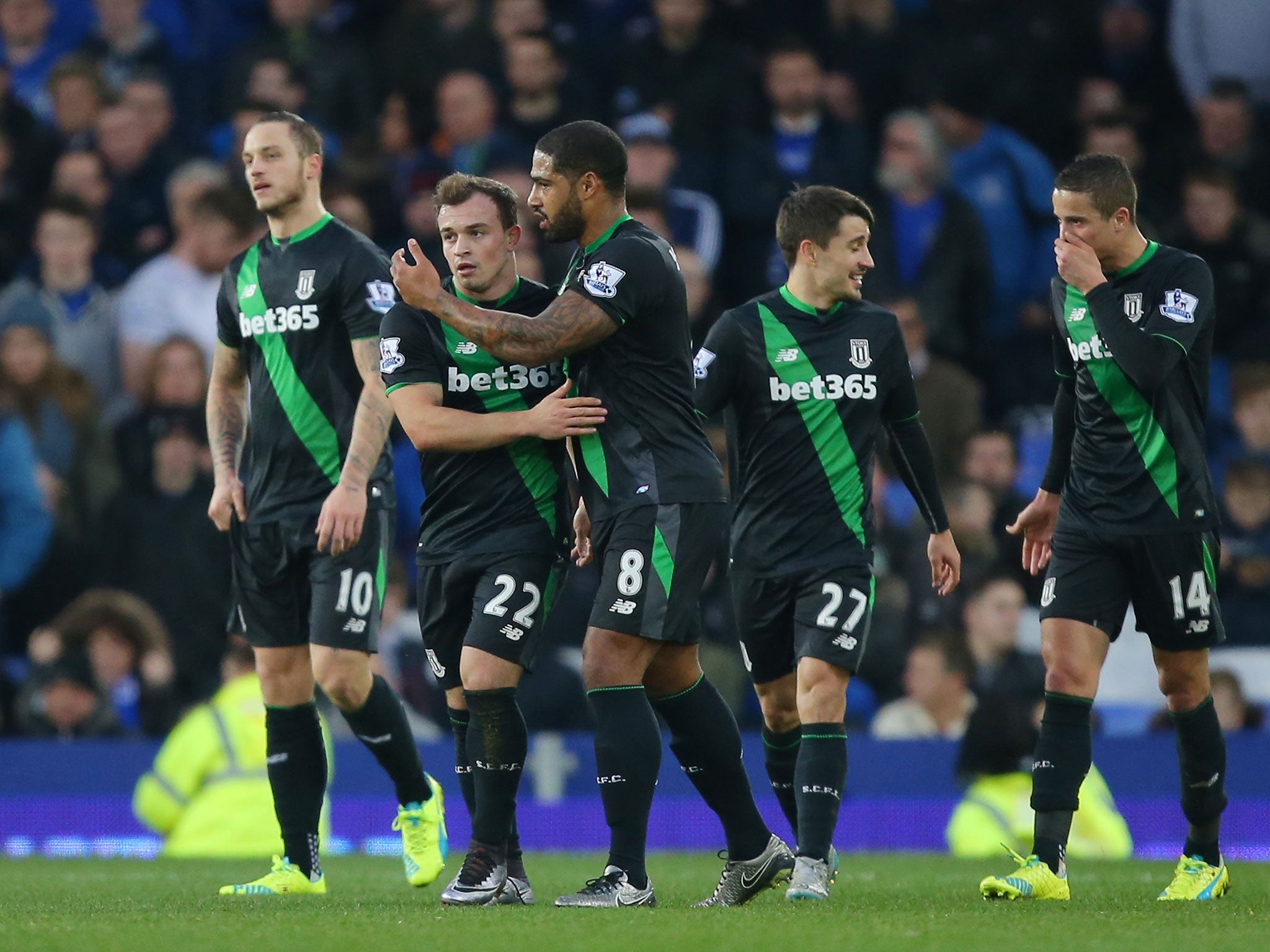 Xherdan Shaqiri is congratulated by his team-mates