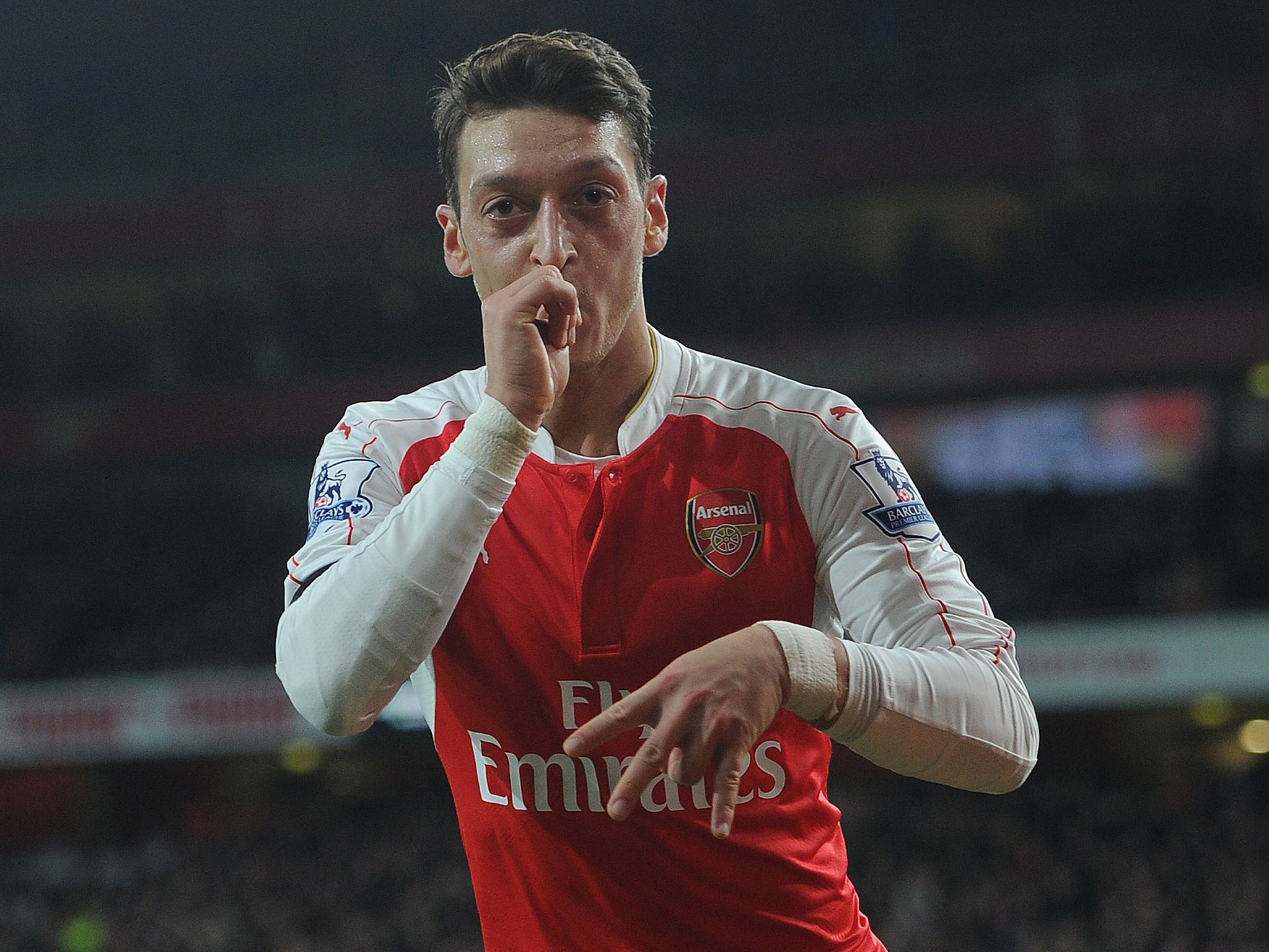 Mesut Ozil celebrates his goal against Bournemouth